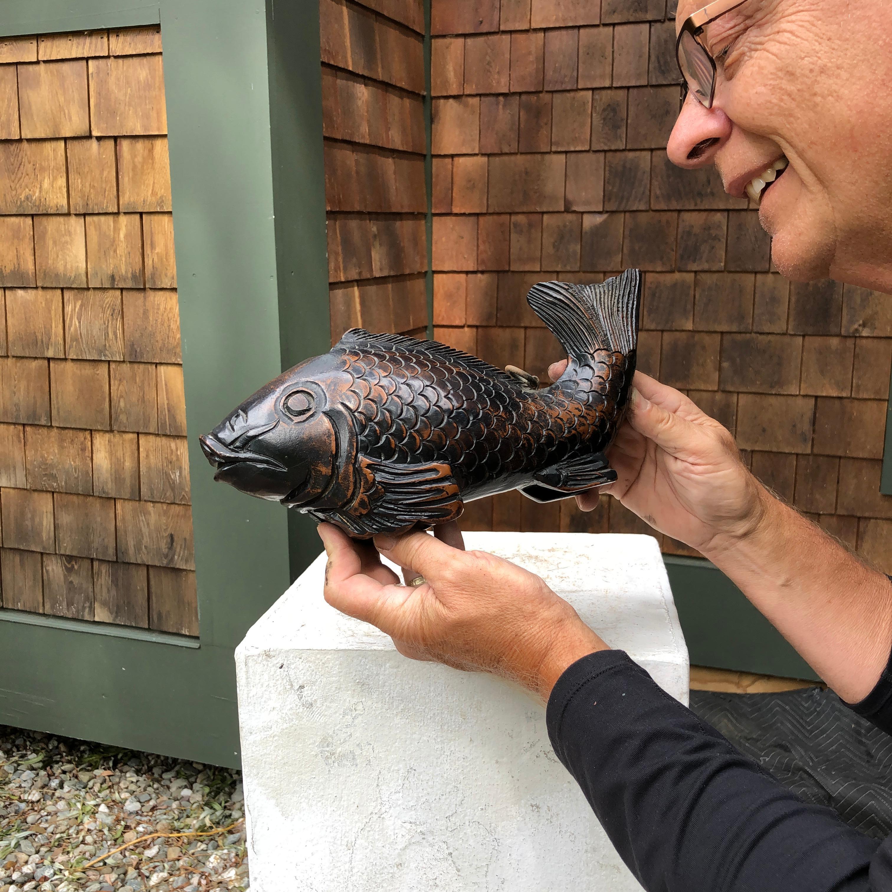 From our recent Japanese Acquisitions Travels- a neat catch with a sassy tail.

A large fine old Japanese 19th century hand carved wooden KOI fish sculpture symbolic of prosperity, perseverance and good fortune. This big fish displays a beautiful