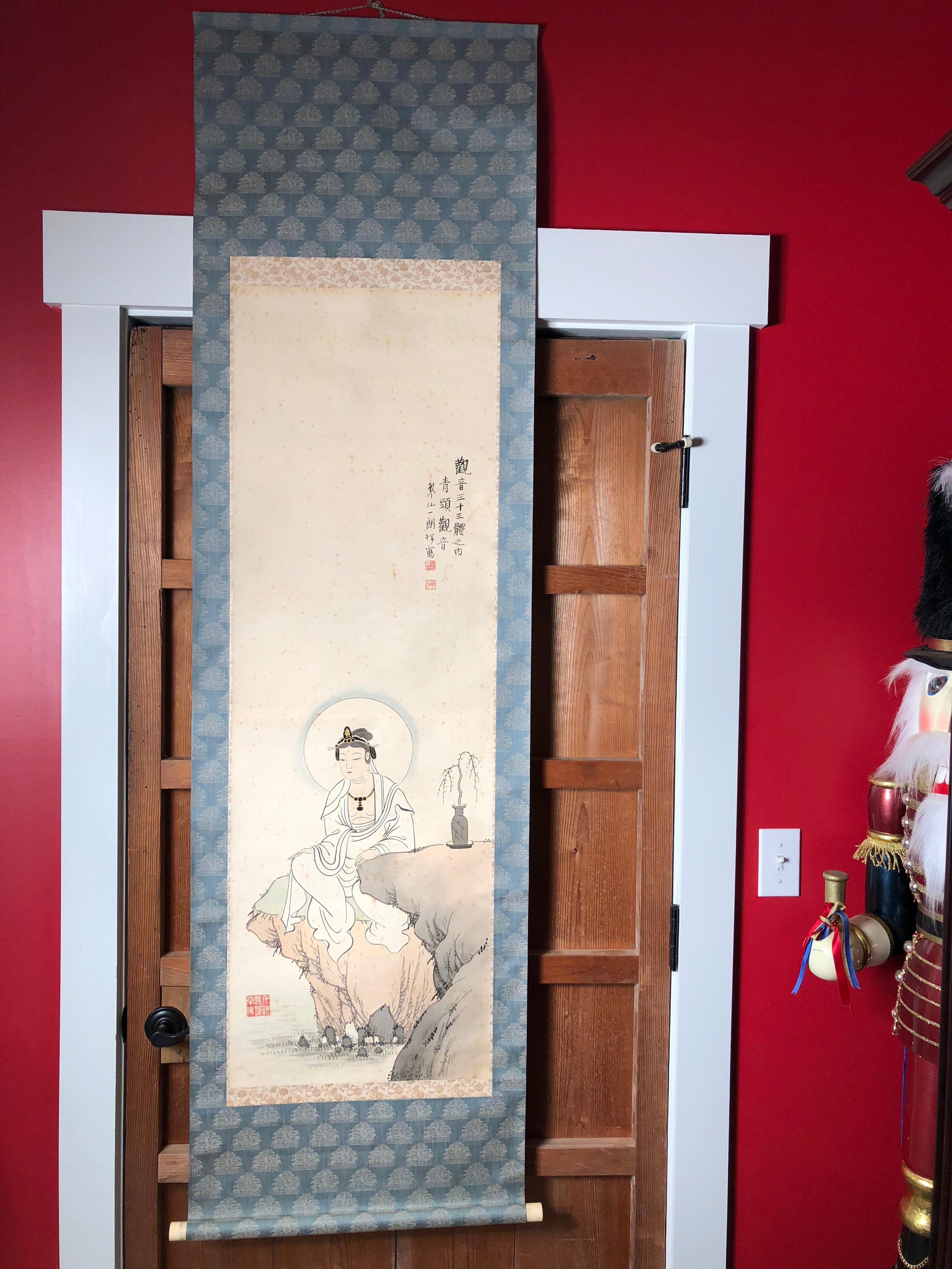 A beautifully executed Japanese antique hand-printed scroll of kanon Guan Yin worthy of your favourite room.
Hand painting on silk in simple classic Japanese striking soft pleasing colors, signed.

Bone rollers.

Signed Keinse.

An appraisal