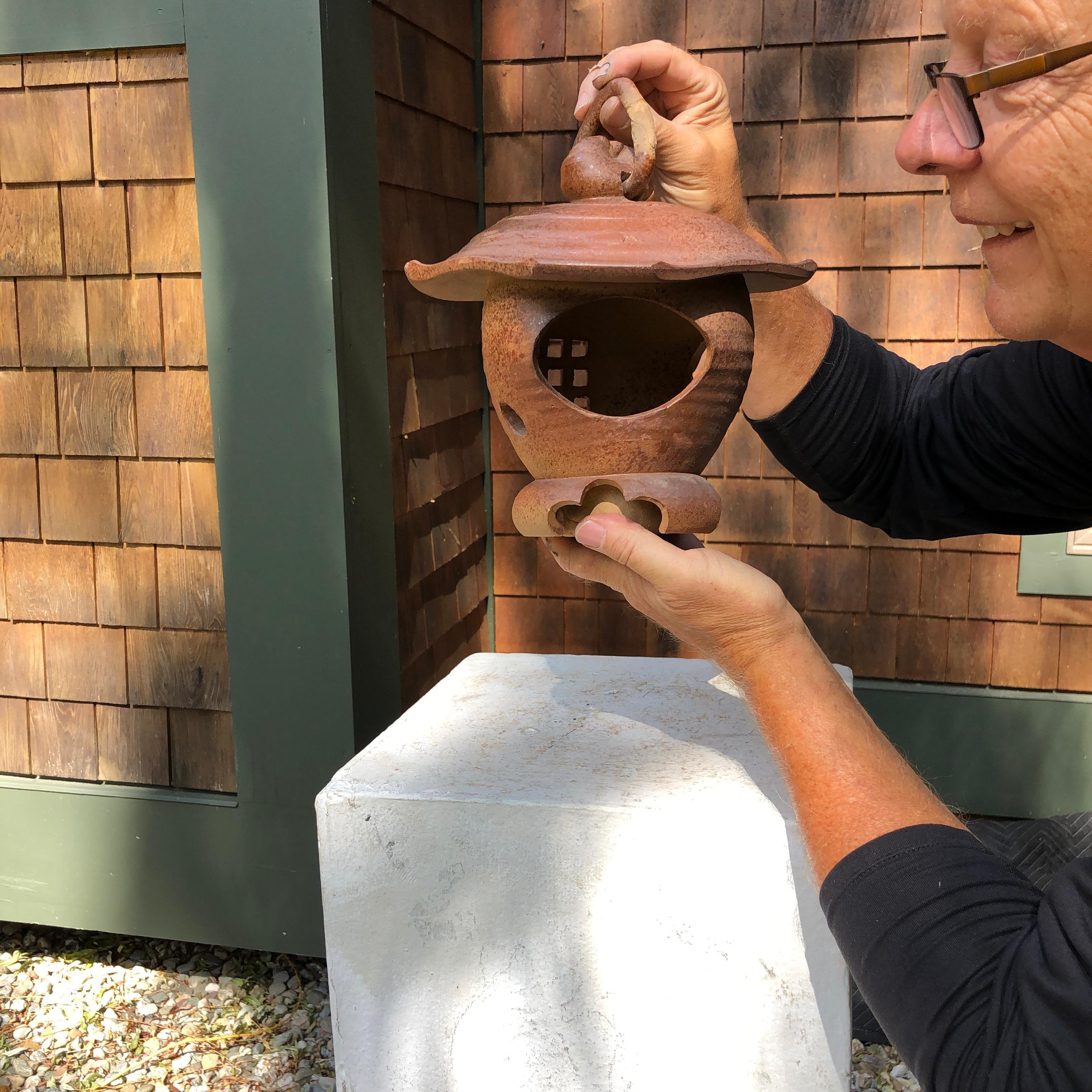 From our recent Japanese New Acquisitions 

First we have seen and in excellent condition with no repairs or damages.

This is a quite old and seldom seen oval form hand formed hanging stoneware lantern crafted in -Shino-yaki- style and kiln. It may