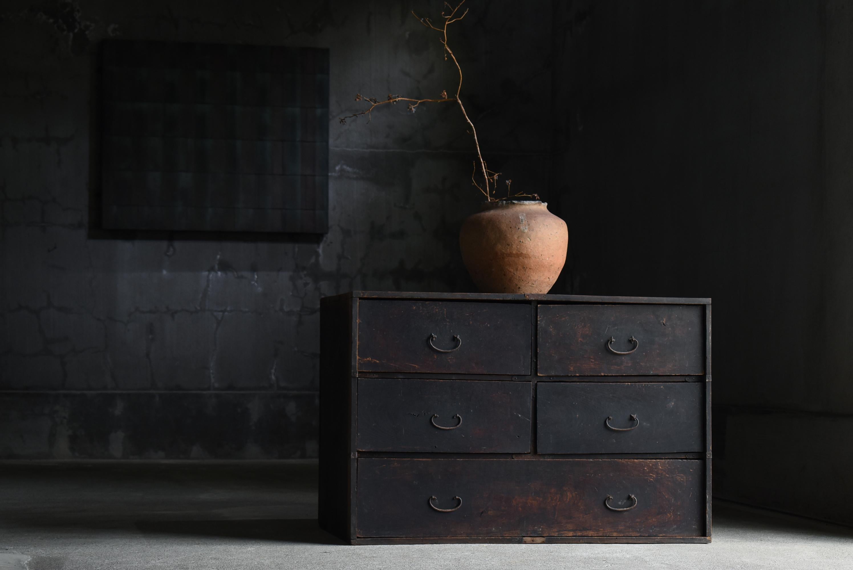 Very old Japanese large drawer storage.
The furniture is from the Meiji period (1860s-1900s).
It is made of zelkova and cedar wood.

The design is simple and lean.
It is a uniquely Japanese simplicity and a very beautiful piece of furniture. It is