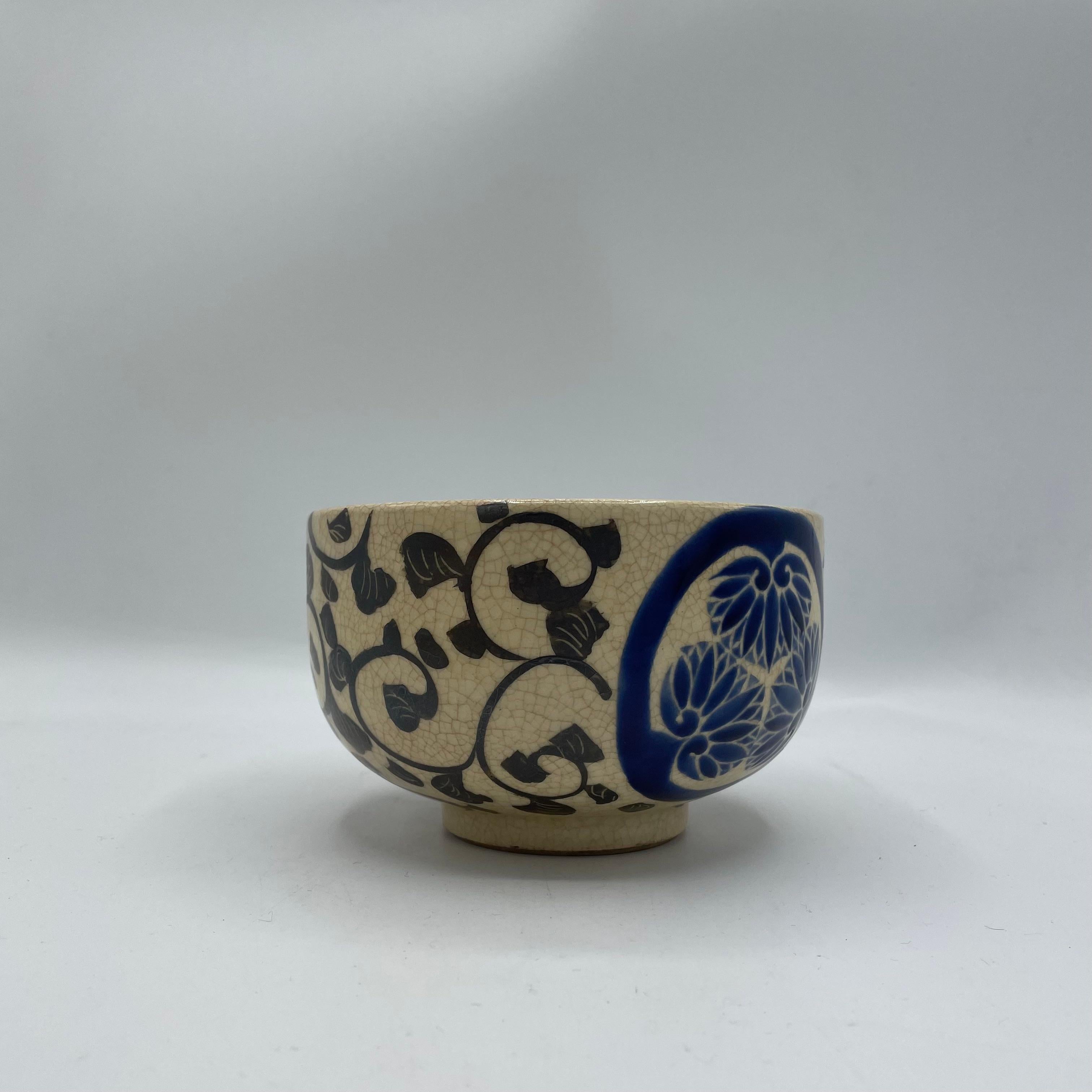 This matcha bowl was made in Japan around 1960s in Showa era.
This bowl will come with a wooden box.
This bowl is made with porcelain and it has family crest of Tokugawa. 
This bowl is used to use for drinking matcha during a tea