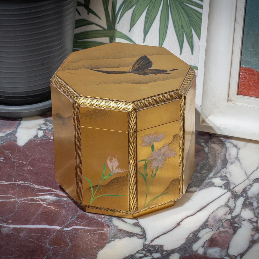 MEIJI PERIOD (1868-1912) 

From our Japanese collection, we are delighted to offer this Japanese Lacquer Octagonal Hokai Box. The Lacquer Box of beautiful hexagonal form with a maki-e lacquered body having nine raised panels surrounding a channeled