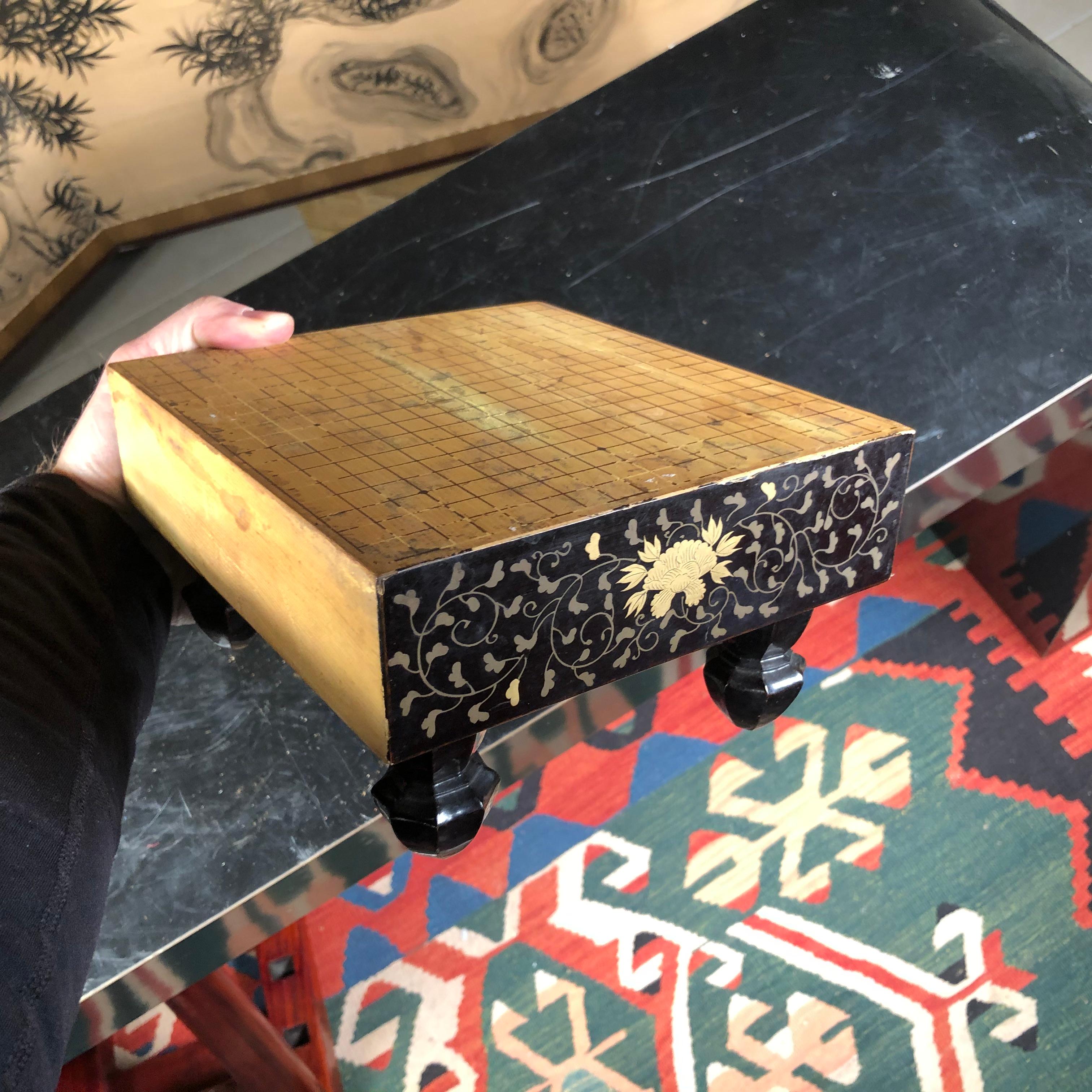 This is a scarce miniature size Goban game table with fine rich gold and black lacquering. It dates to the 19th century, Meiji period.

Rare size.

Dimensions: 4.25 inches high and 8 inches wide

Handcrafted of Kaya wood.

Rich gold and