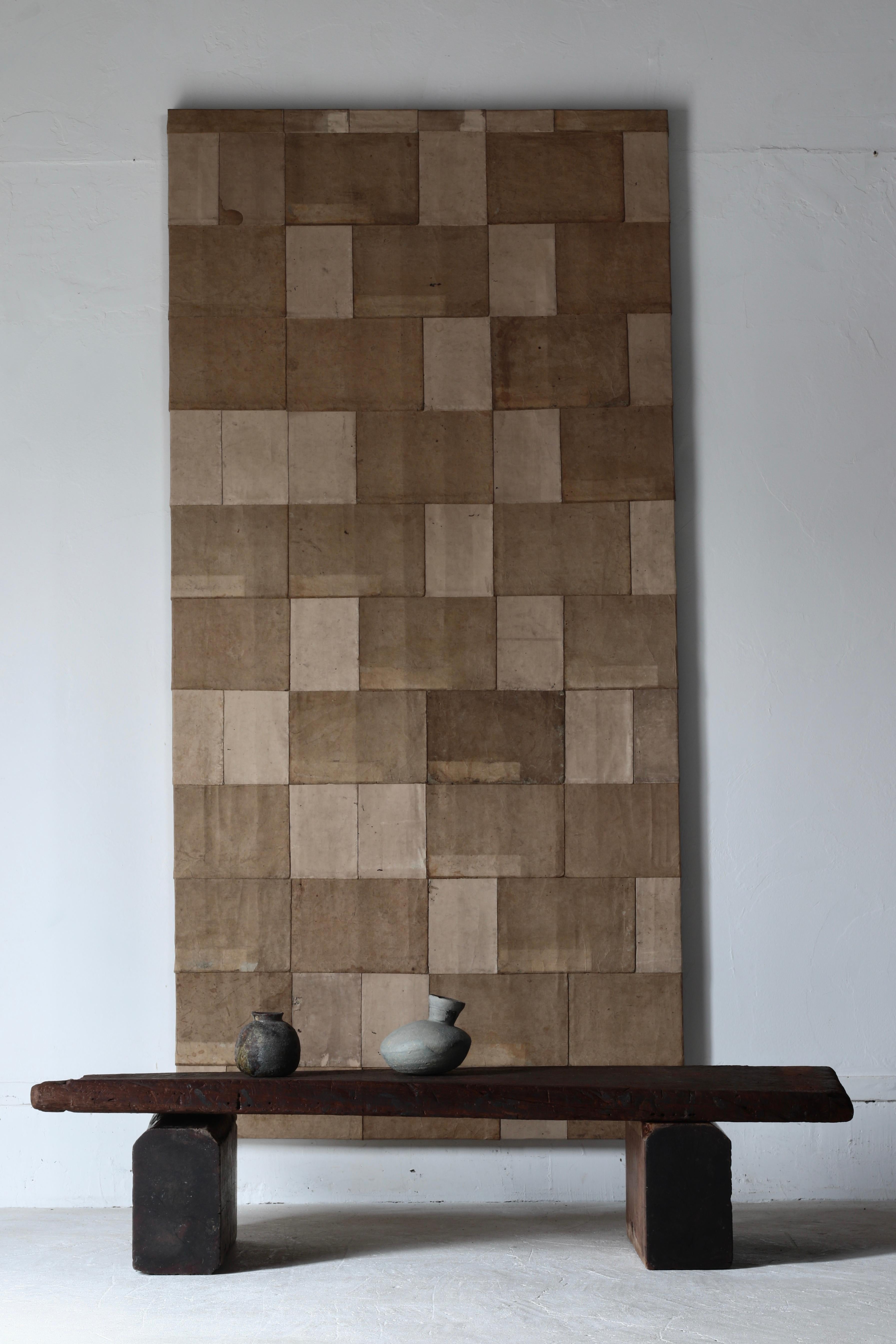 This is an original wall decoration made by combining old Japanese things. 

I used the covers of old books from the Edo period to the Meiji period and pasted them randomly. 
I used brown and white earth color paper to create a color that goes well