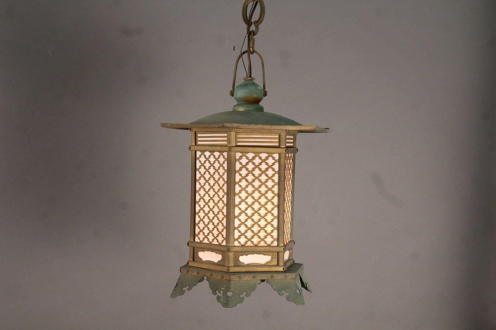 Rare find

Japan, a handsome high quality pair of tall bronze and copper lantern form Light fixtures, original and with new rewiring,internal socket, and paper liners , circa 1930s.  Immediately installable.

They come complete with hanging