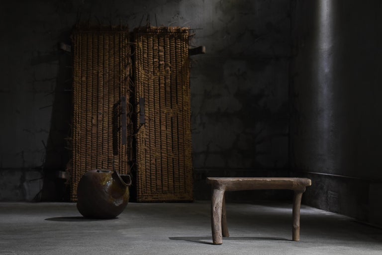 This is a very old Japanese stool.
It is from the Meiji period (1860s-1900s).
Amazingly, it is carved with a single sword.

Seat size: 610mm x 170mm

It is sturdy and stable.

It is rustic and tasteful, and gives a sense of the world of 