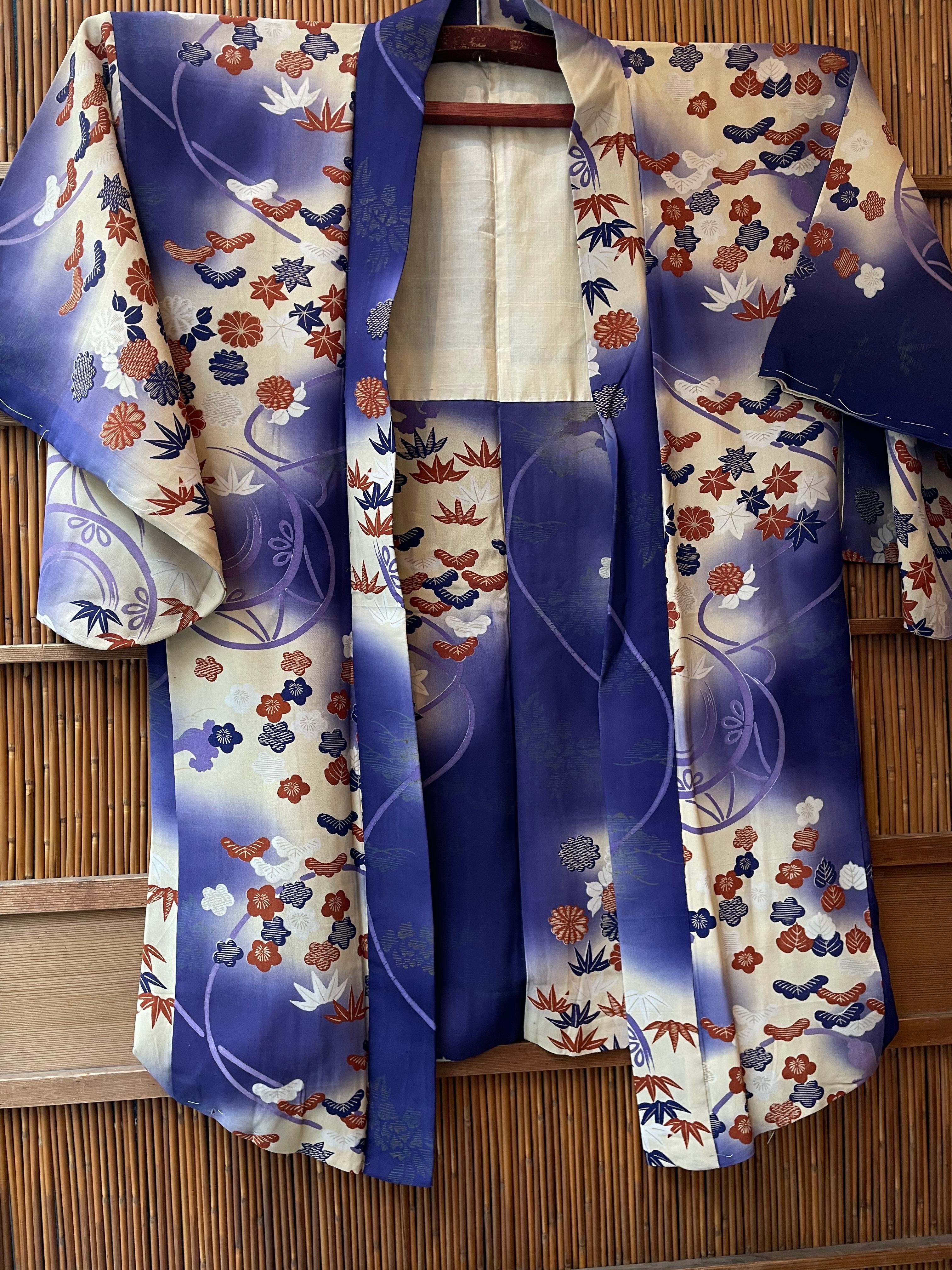 This is a silk jacket which was made in Japan.
It was made in Showa era around 1950s.

The haori is a traditional Japanese jacket worn over a kimono. Resembling a shortened kimono with no overlapping front panels, the haori typically features a