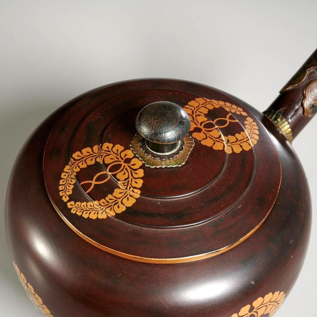 A Japanese lacquer water ewer without handle (known as hazo in Japanese) that was used to carry water, traditionally together with a large basin (known as tsunodarai) for domestic use. The piece was made of lacquered wood in a deep brown color with