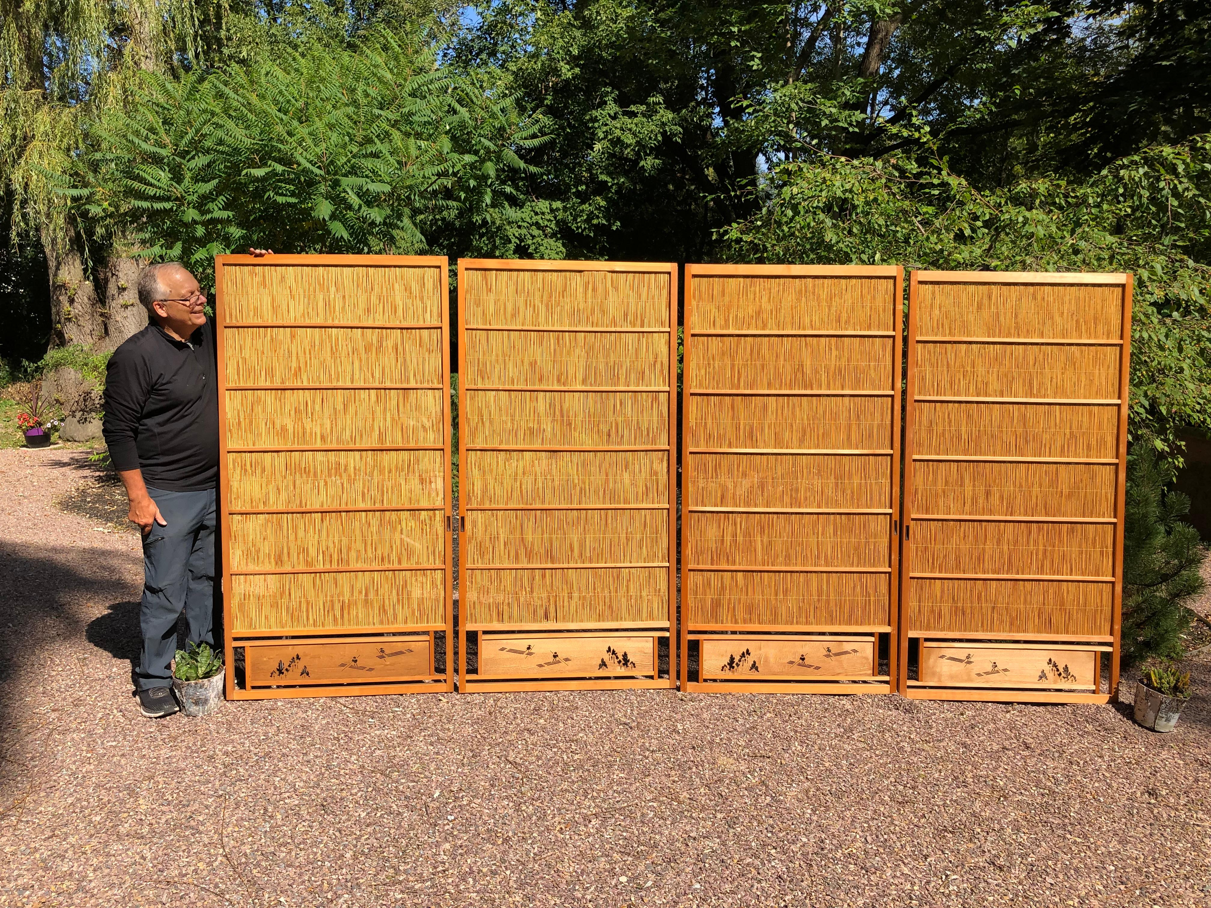 Trees and boats accents

Japan, a fine set of four (4) antique shoji natural bamboo lacquered doors or screens recently acquired from a Japanese private collector. The hand carved bottom boards are artistically perforated with boats and