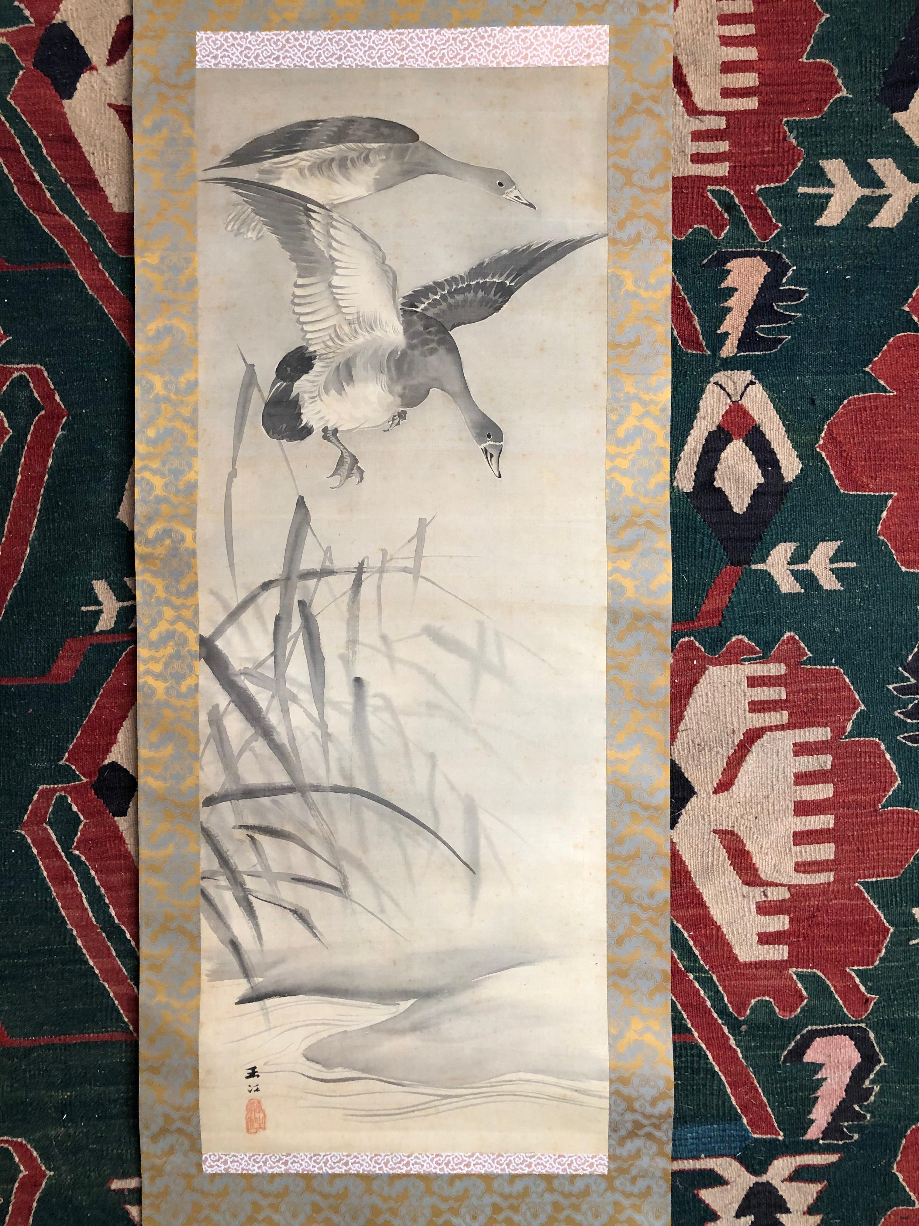 two hands painting
