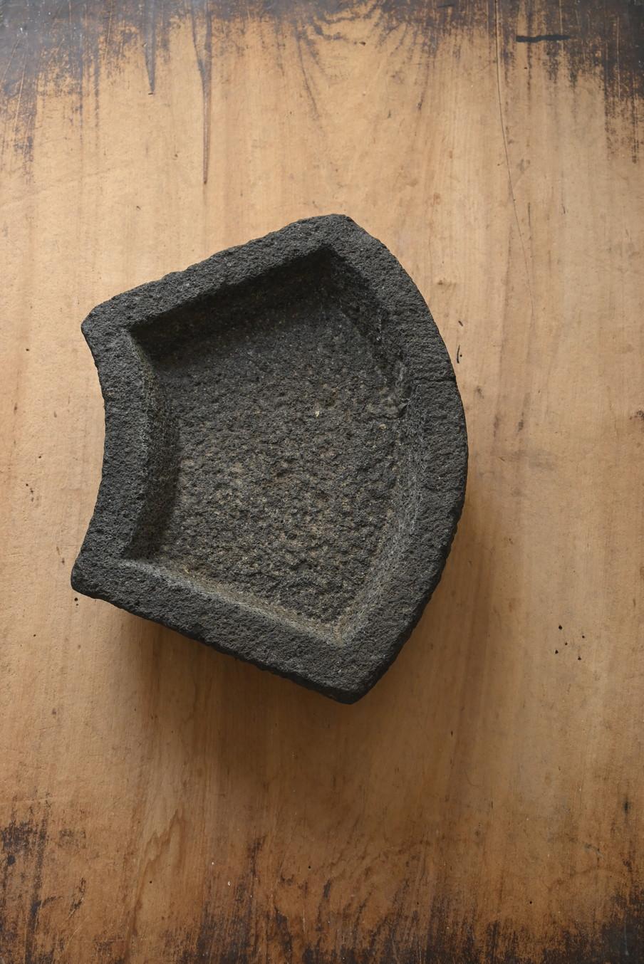 This is an old tsukubai (stone basin) believed to have been made in Japan.

In Japanese culture, there is a long-standing tradition of designing gardens that reflect the changing beauty of the four seasons. Among the elements that express the spirit