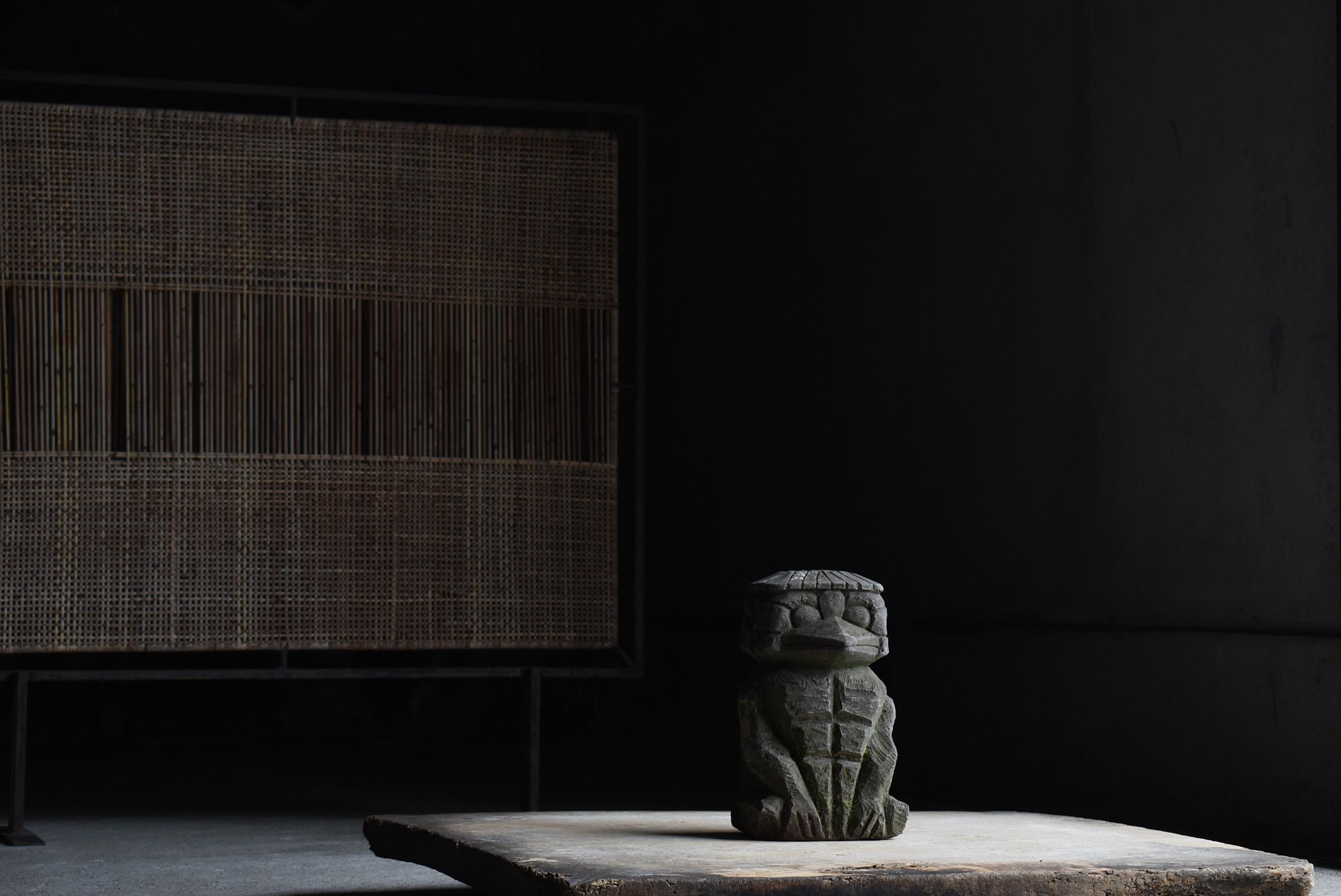 This is a very old stone kappa made in Japan.
It dates from the Meiji period (1860s to 1900s).

Kappa are monsters that inhabit rivers, ponds, oceans, and other bodies of water, and are believed to be water gods.
In modern times, they are regarded