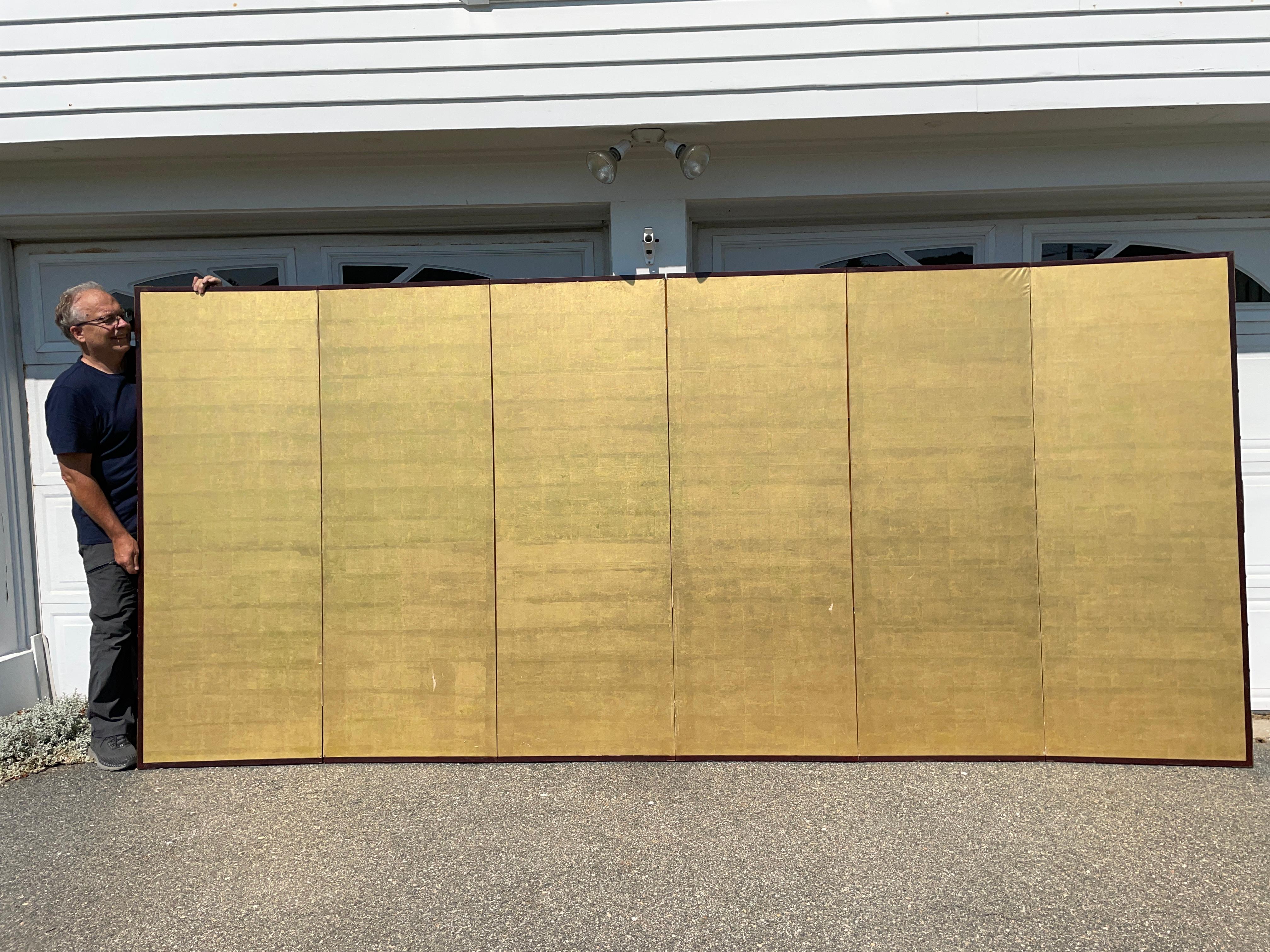 From our recent Japanese Acquisitions

One of a pair currently available

Fashioned by hand in stunning gold leaf.

Japan, a fine six-panel screen byobu carefully crafted by a professional artisan with hand applied gold leaf. This attractive screen