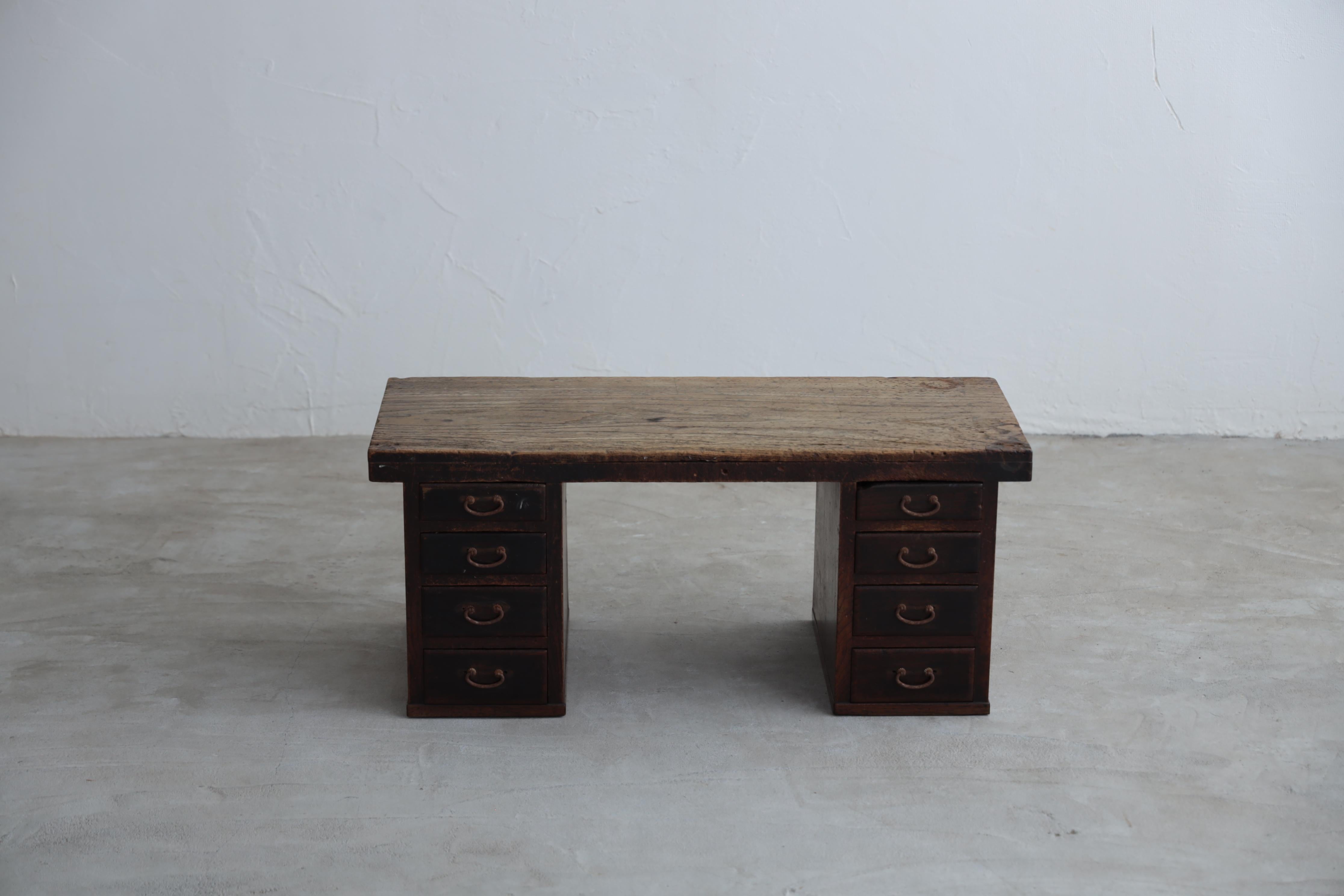 This antique Japanese table was produced in the Taisho period (1912-1926).

This is a double-sleeved desk whose lacquer has gained a deep flavor over time. The zelkova wood(Japanese Unique Wood) used throughout has a beautiful wood grain. Over time,