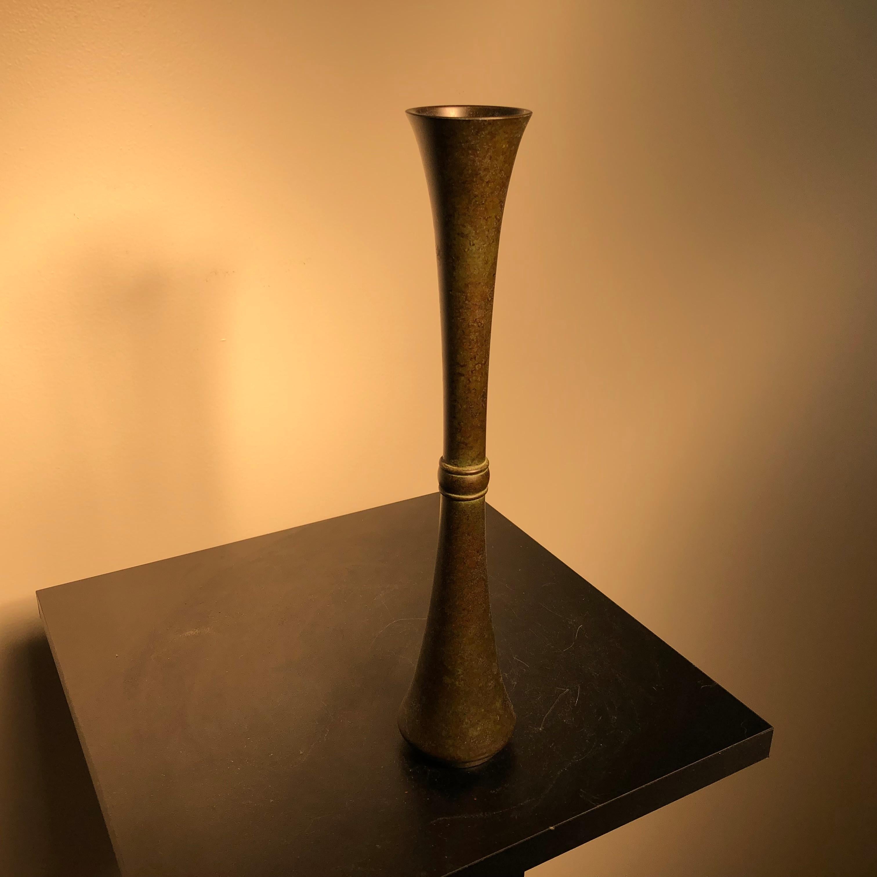 tall bronze vase