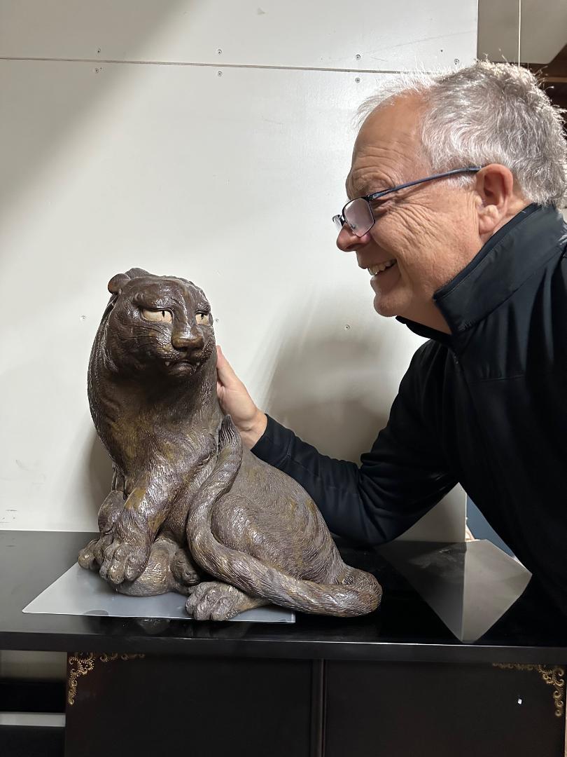 From our recent Japanese Acquisition travels

A large handsome and animated antique handmade, hand painted, and hand glazed big female tiger with baby-hand painted eyes dating to the early 20th century from Japan's famous Bizen kiln.  Hard to