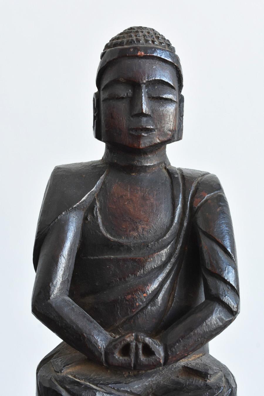 It is a wooden Buddha statue made in the Edo period in Japan.

And this pose is called 