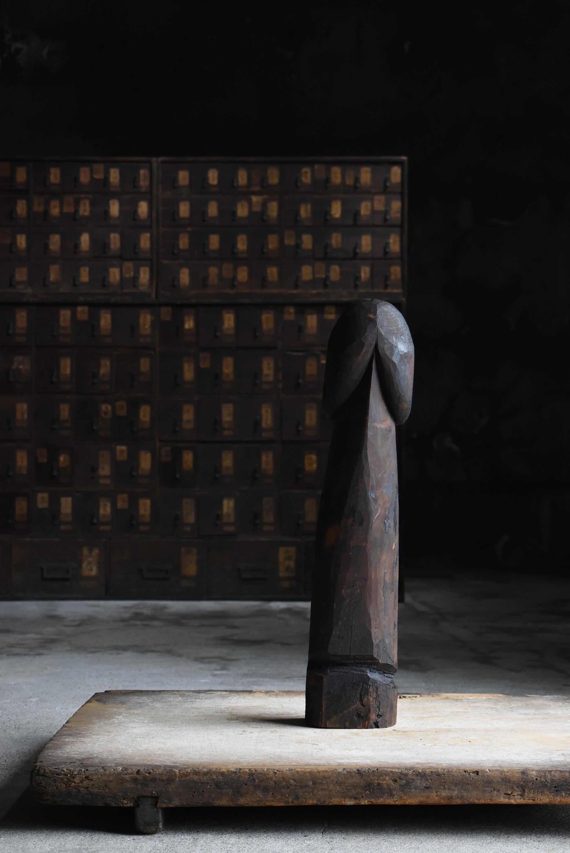 This is an old carved large wooden penis statue made in Japan.
It was made during the Edo period (1800s-1860s) and is made of cedar.

In the Tōhoku region of Japan, there has long been a custom of worshipping the phallic penis, and wooden carvings