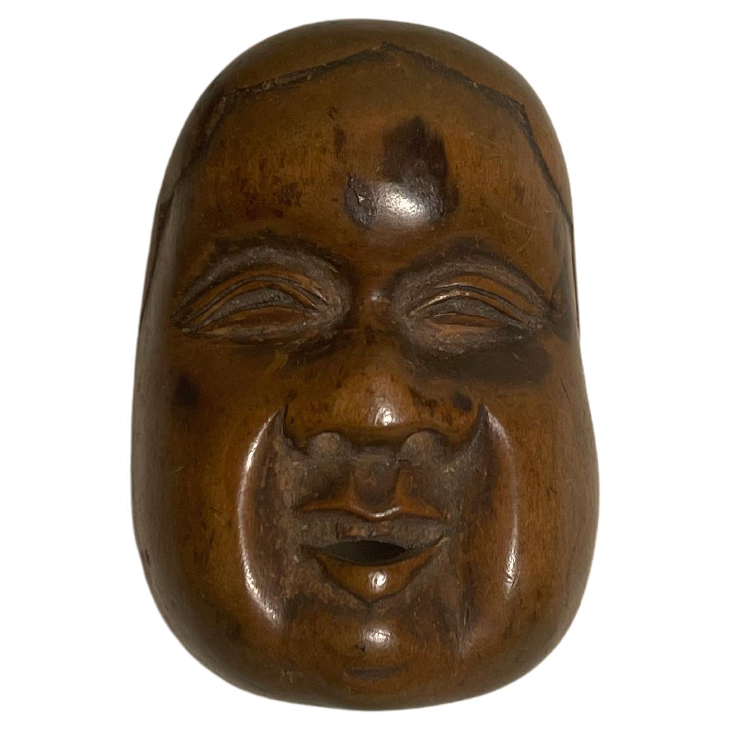 Netsuke japonais ancien en bois "Onnamen" années 1950