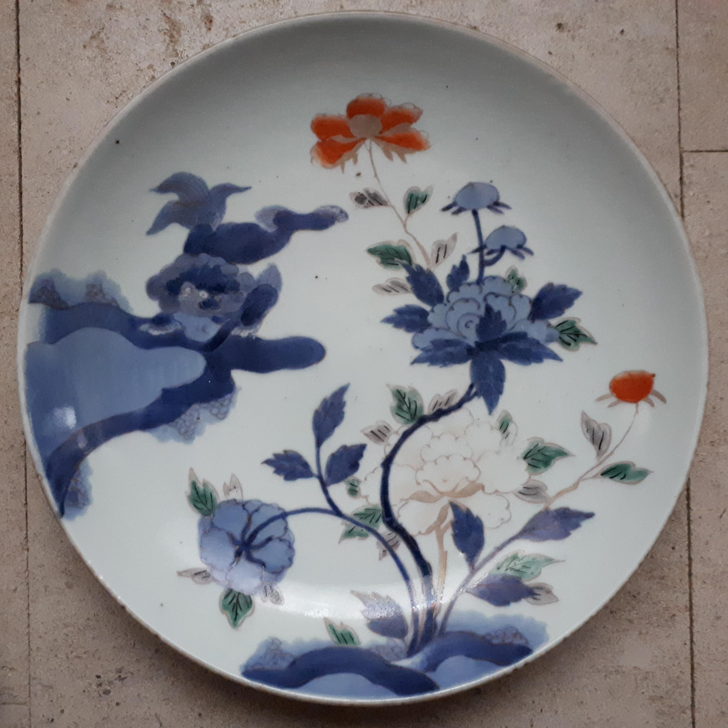 Arita porcelain dish with decoration of a shishi among peonies.
Apocryphal Chenghua mark on reverse.
Japan, 18th century
