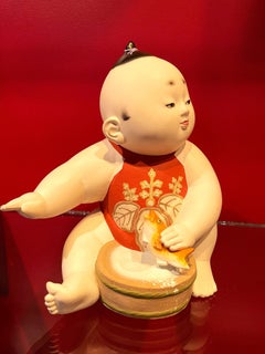 Japanese Art Deco Showa Period Hakata Ningyô of a Boy Holding a Fish, Ca. 1920