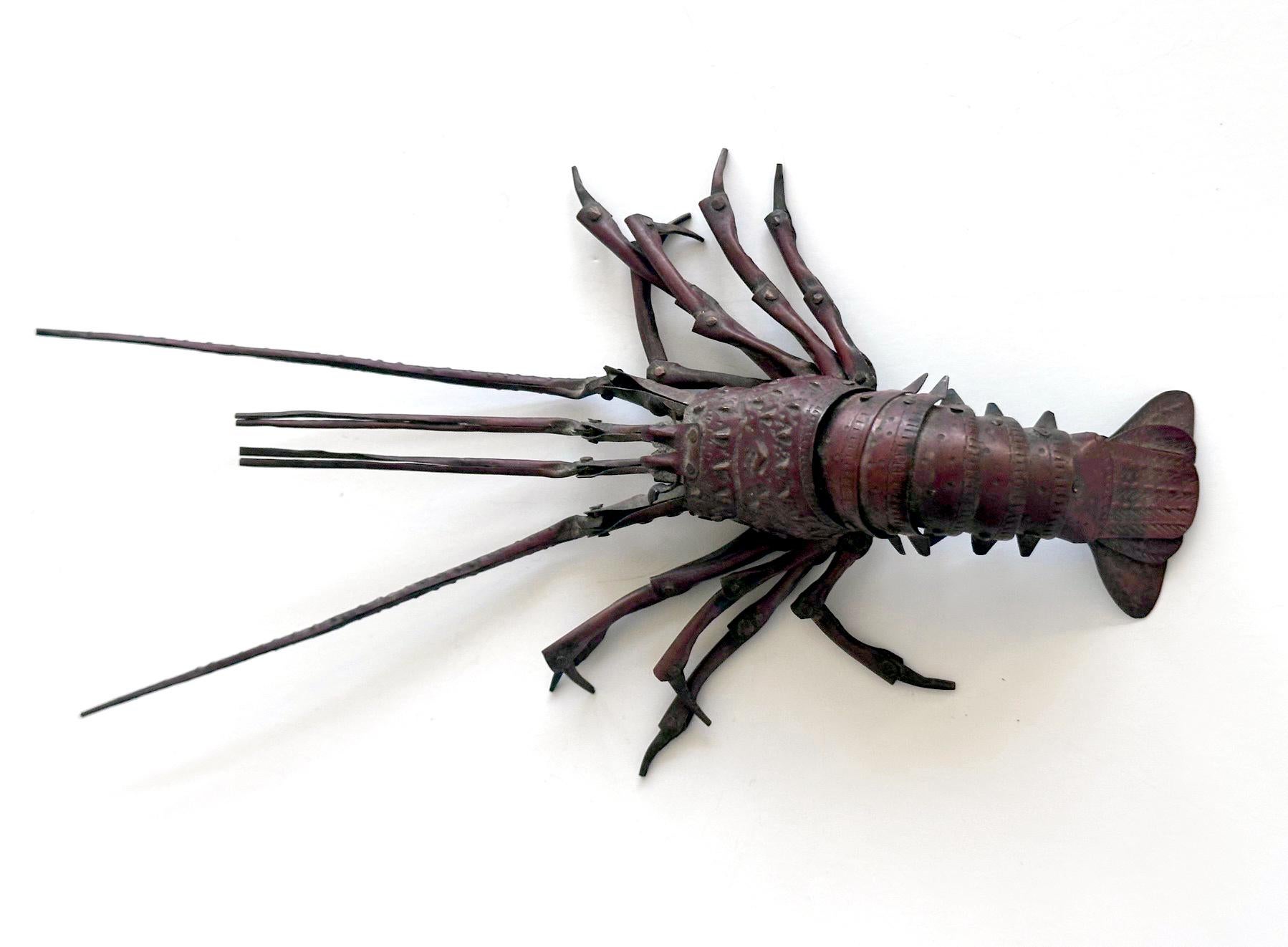 On offer is an articulate spiny lobster (Ise-Ebi) made by Myochin Hiroyoshi in the late Meiji Period circa 1890-1900s. As an ornamental display item, this type of item is known in Japanese as Jizai Okimono. The lobster was meticulously constructed
