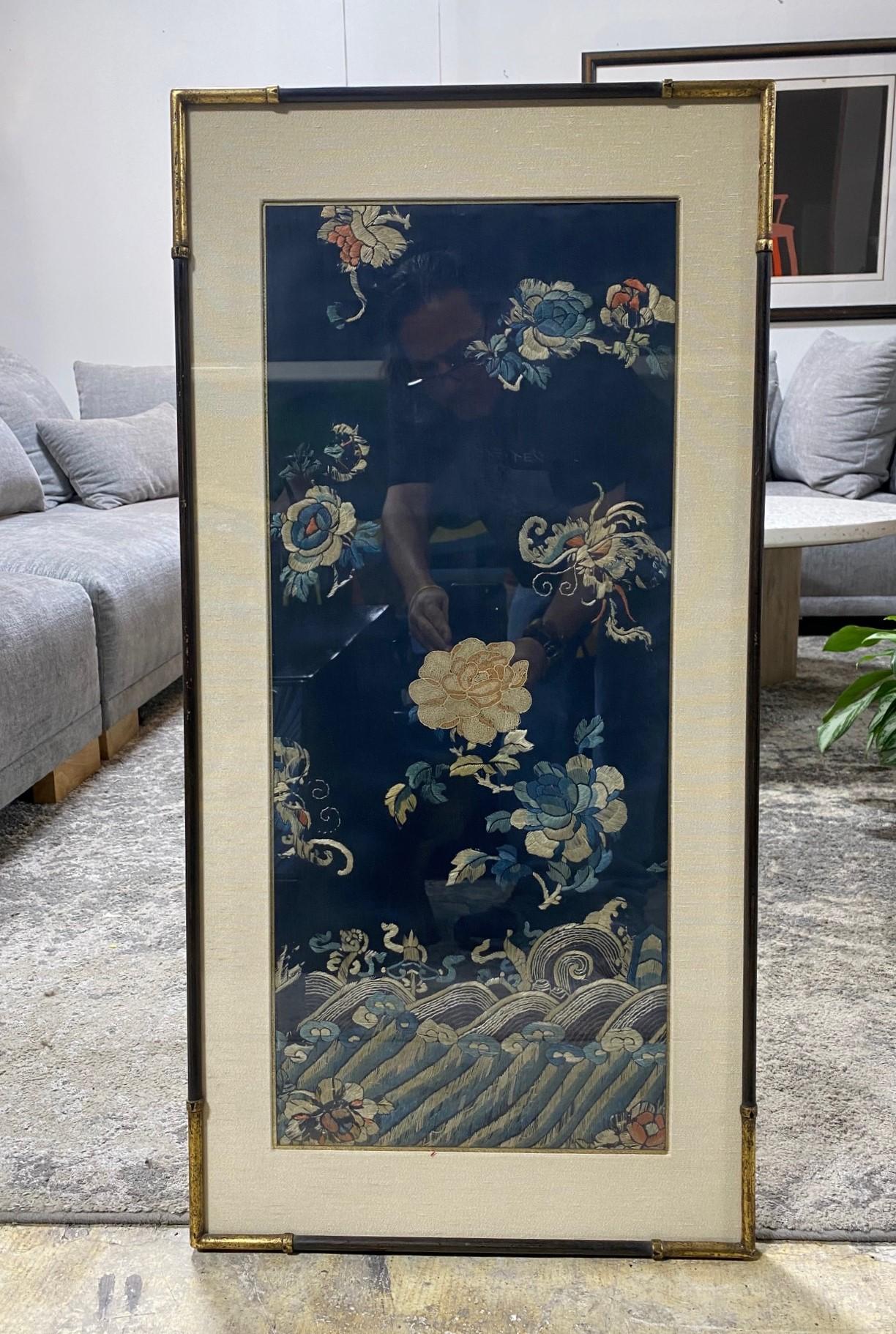 A beautiful and wonderfully designed/composed Japanese textile panel with embroidery floral natural landscape/flower decoration.  The work is presented in a gilt wood frame with a silk mat and gold leaf corners.  The ultra-fine needlework is quite