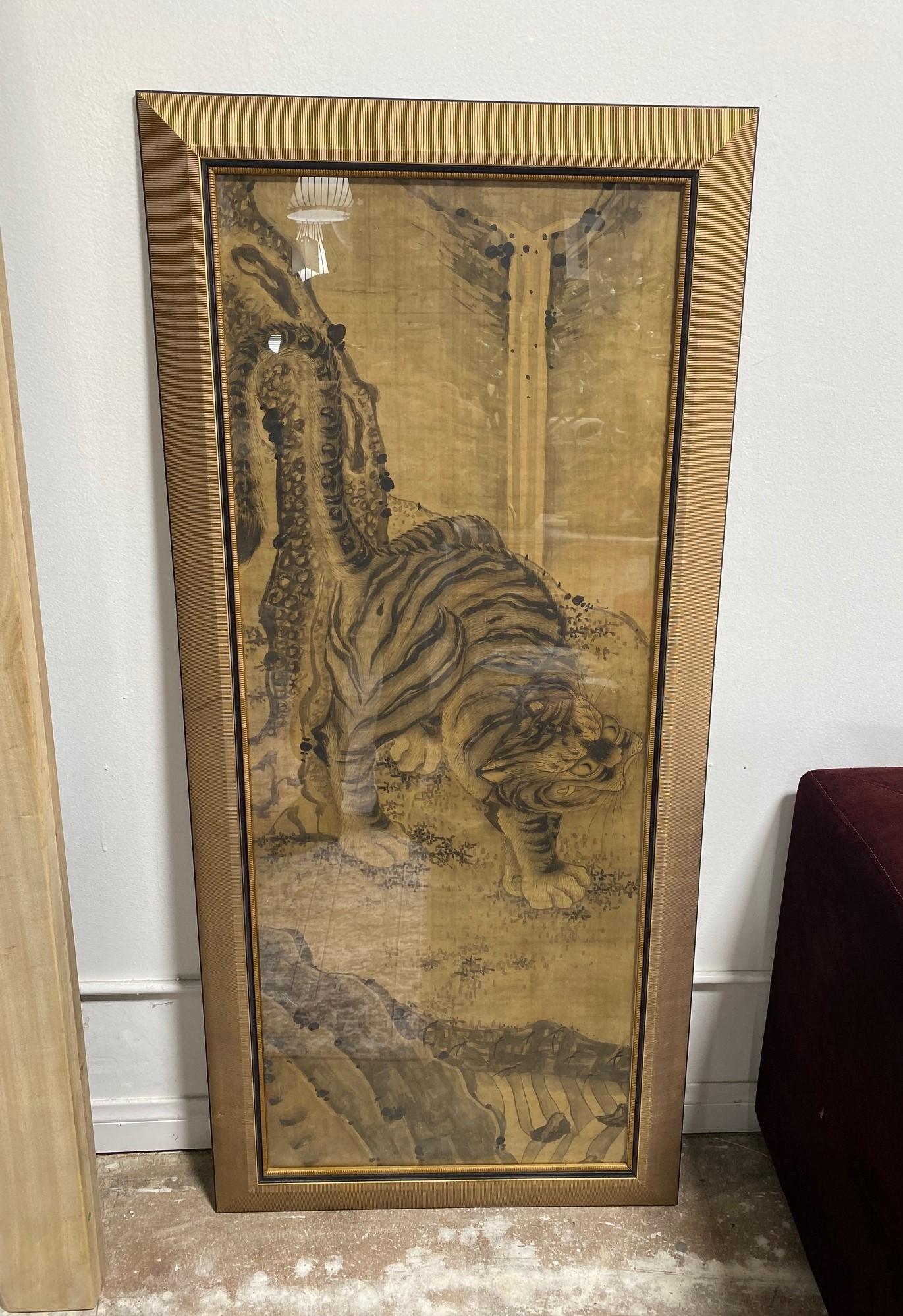 A beautiful and striking Japanese Edo period tiger scroll. Hand-painted with masterful brushstrokes on a silk surface. Wonderfully captured and composed with a hint of mischief. 

This work was acquired along with another who we believe could be