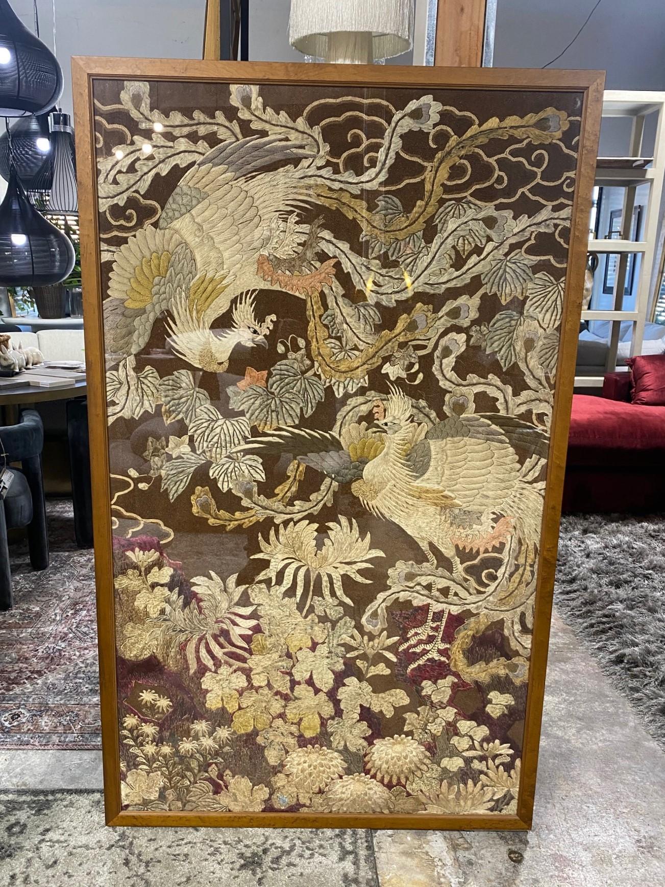 A stunning Meiji Period (1868-1912) Japanese large framed embroidery/ tapestry featuring a pair of finely detailed birds - likely peacocks in a floral garden landscape.  A truly magnificent work in both scale and design - quite wonderful and