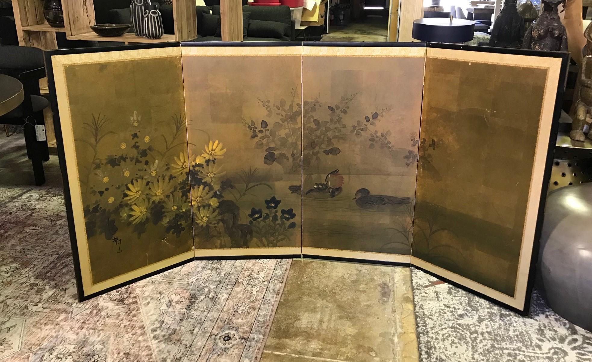 A gorgeous four-panel Japanese Byobu folding screen depicting two ducks on a tranquil pond with colorful floral landscape touches. The rich colors, gold leaf, and beautiful hand painted detail really makes this an attractive work.

Original