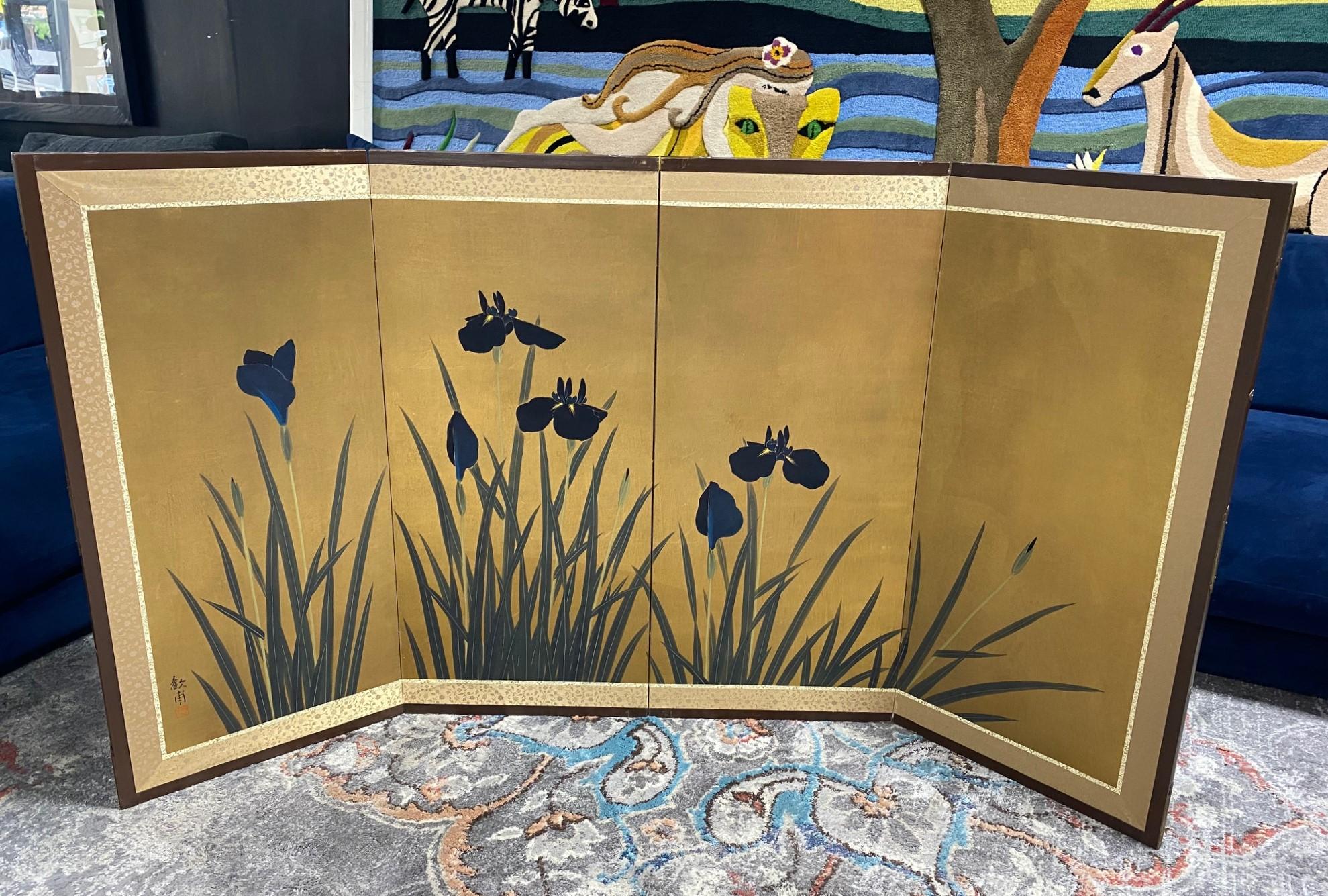 A gorgeous four-panel Japanese Byobu folding screen depicting a nature landscape scene with blossoming iris flowers - perhaps an homage to the famed Irises screens by the famed Japanese artist Ogata Korin of the Rinpa school. The bold, rich purple