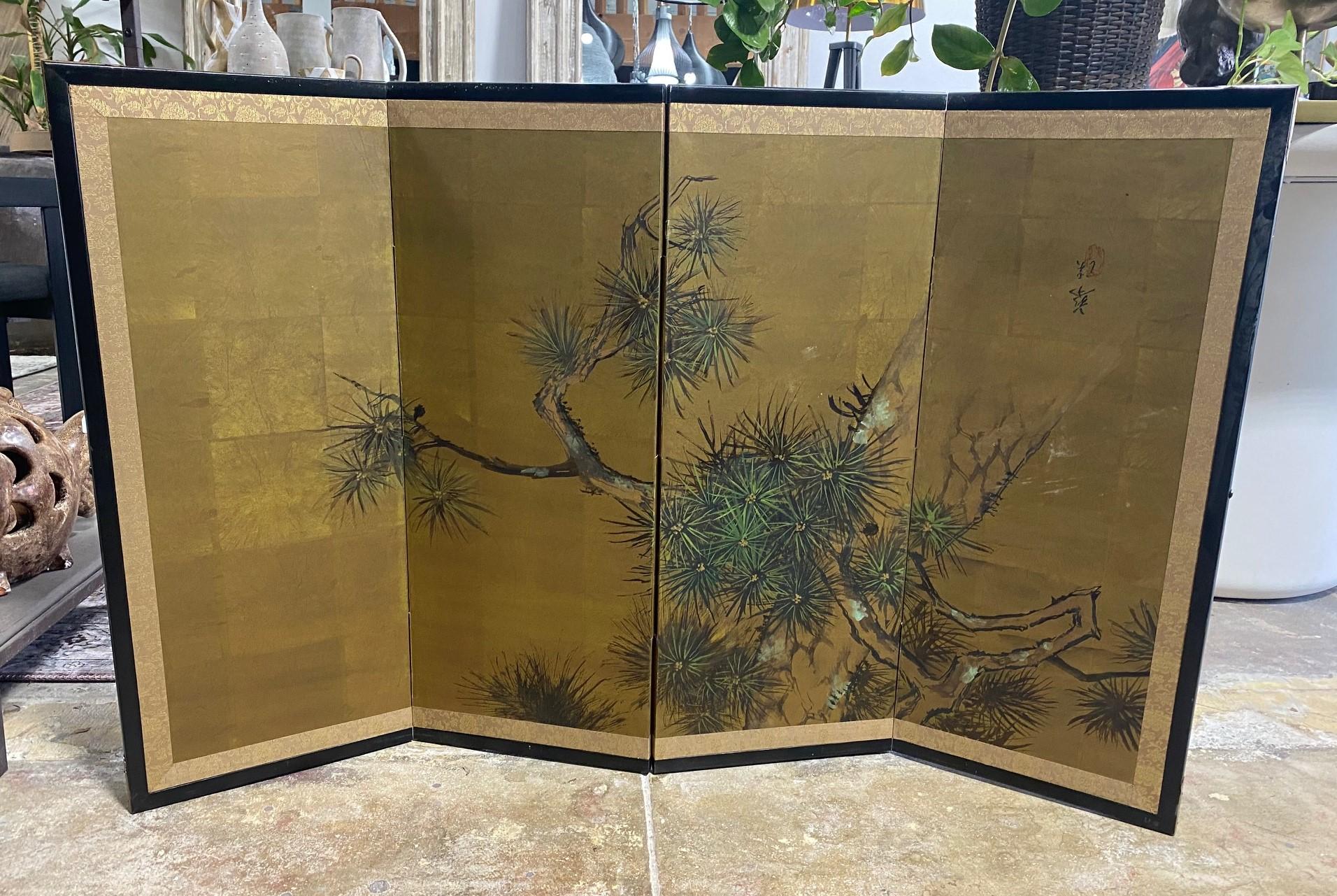 A gorgeous four-panel Japanese Byobu folding screen depicting a nature scene with an extended pine tree branch. The dark, rich colors, gold leaf, and beautiful hand-painted detail of the tree's thistles make this an attractive and special