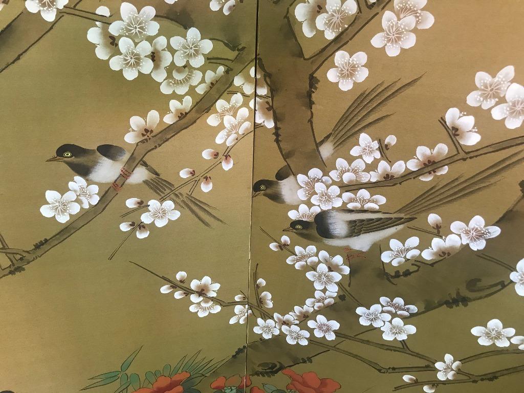 A gorgeous and whimsical four-panel Japanese Byobu folding screen depicting birds playing in a blossoming tree. The rich colors, gold leaf and beautiful hand-painted detail really make this an attractive and unique work.

Original decorative