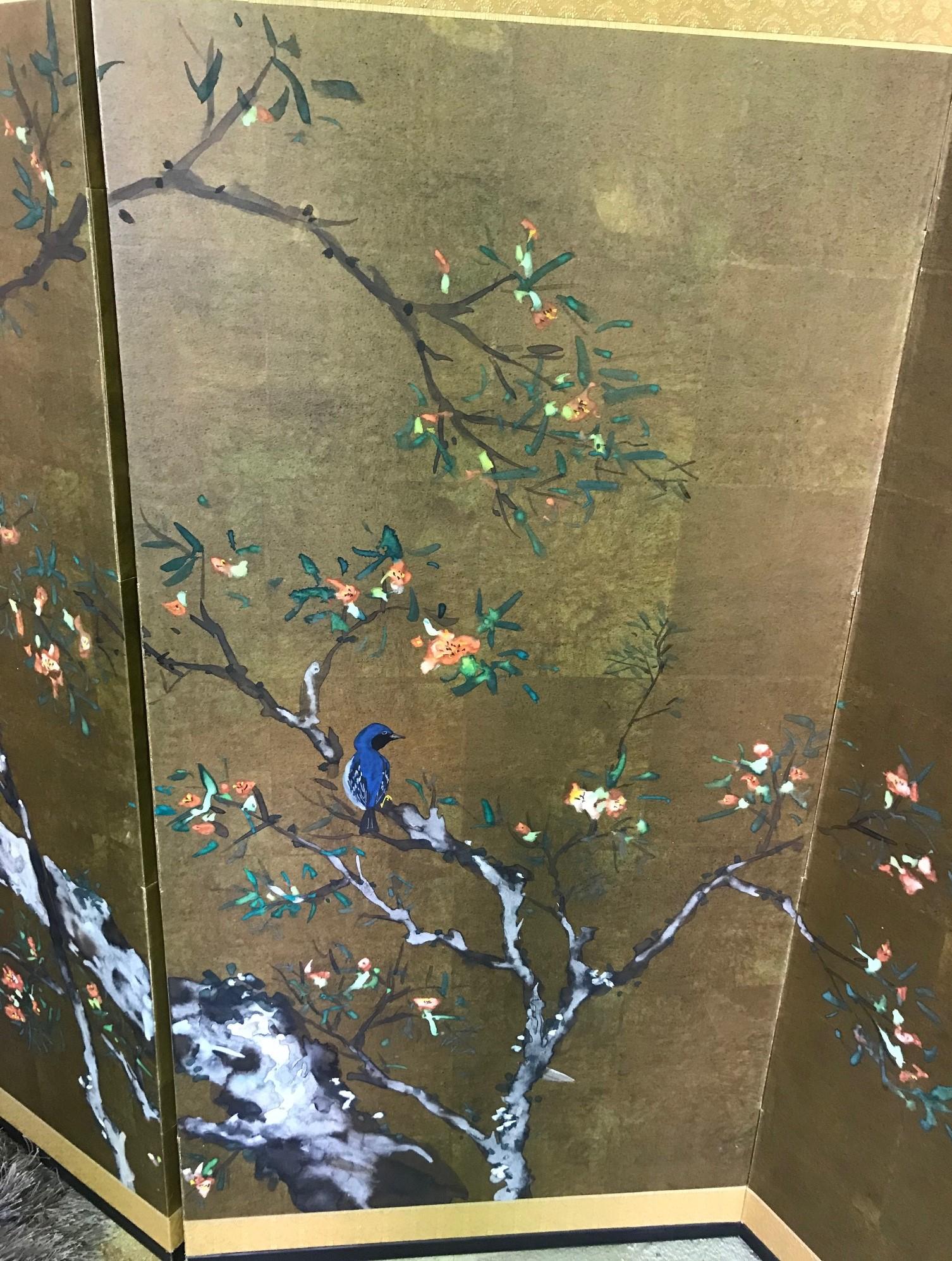 A gorgeous and whimsical four-panel Japanese Byobu folding screen depicting birds playing in a blossoming tree. The rich colors, deep gold leaf and beautiful hand painted detail really make this an attractive and unique work.

Original decorative