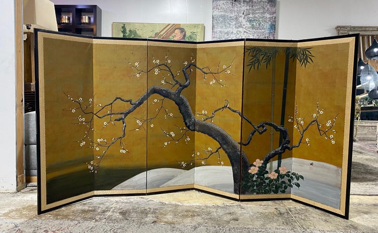 A gorgeous hand-painted six-panel Japanese Byobu folding screen depicting a blossoming cherry tree/ nature scene with a solitary pensive, serene bird in the branches. The deep, rich colors, gold leaf, complex design/composition, and beautiful