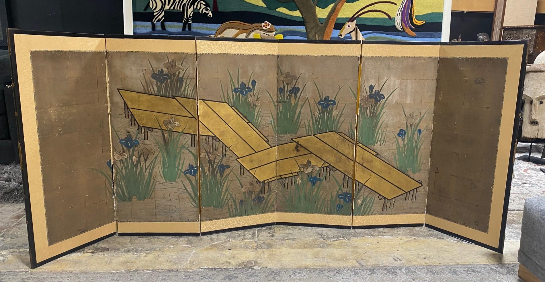 A gorgeous six-panel Japanese Byobu folding screen depicting a nature lake/landscape scene with a water walkway/angular bridge and blossoming iris flowers - perhaps an homage to the famed Irises screens by the famed Japanese artist Ogata Korin