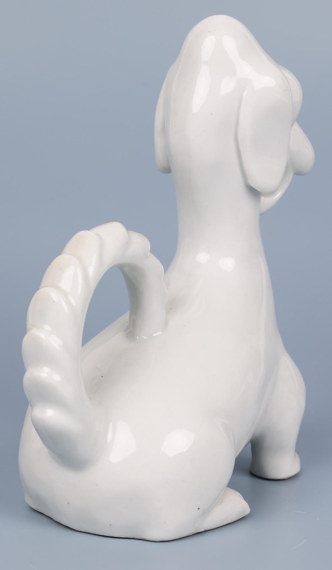 Porcelain Japanese Attributed Blanc de Chine Model of a Stylized Dog For Sale
