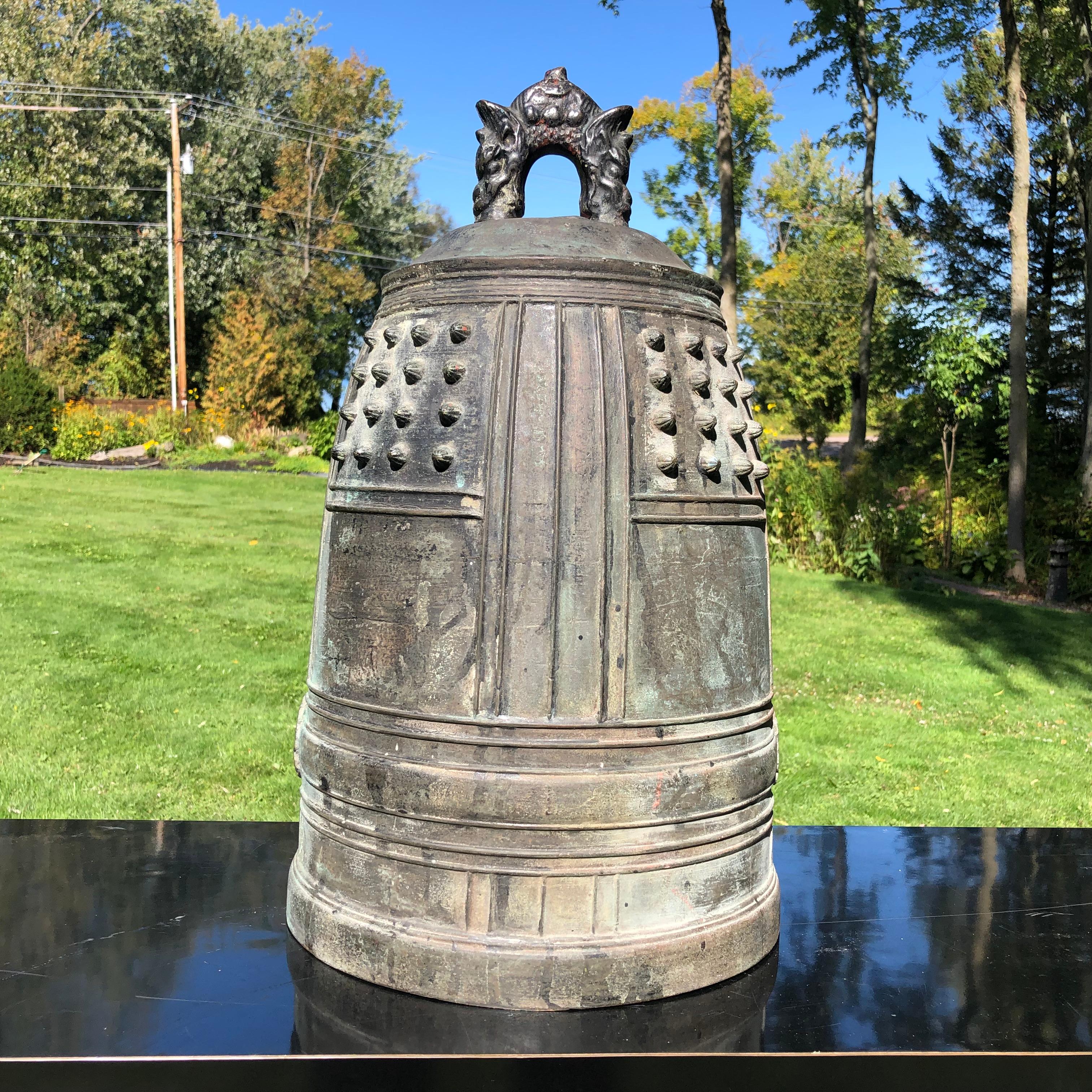 A best find from our recent Japanese Kyoto Travels

Japanese large, substantial antique solid cast bronze temple bell Bonsho with beautiful deep brown and handsome patina from great age. Signed in honor of a caring donor whose family undoubtedly