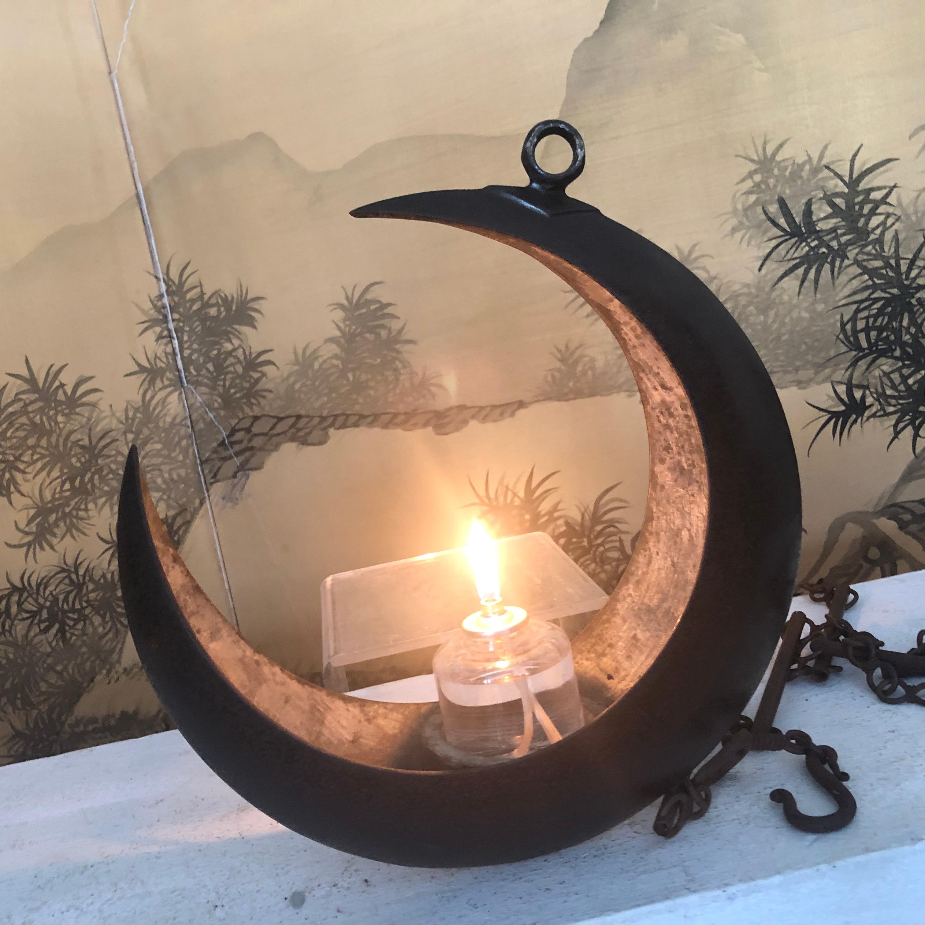 From Our Recent Japanese Acquisitions

From Japan comes this big beautiful and antique hand cast crescent moon lantern or ikebana vase in a large scale size
complete with a fine antique handwrought 96