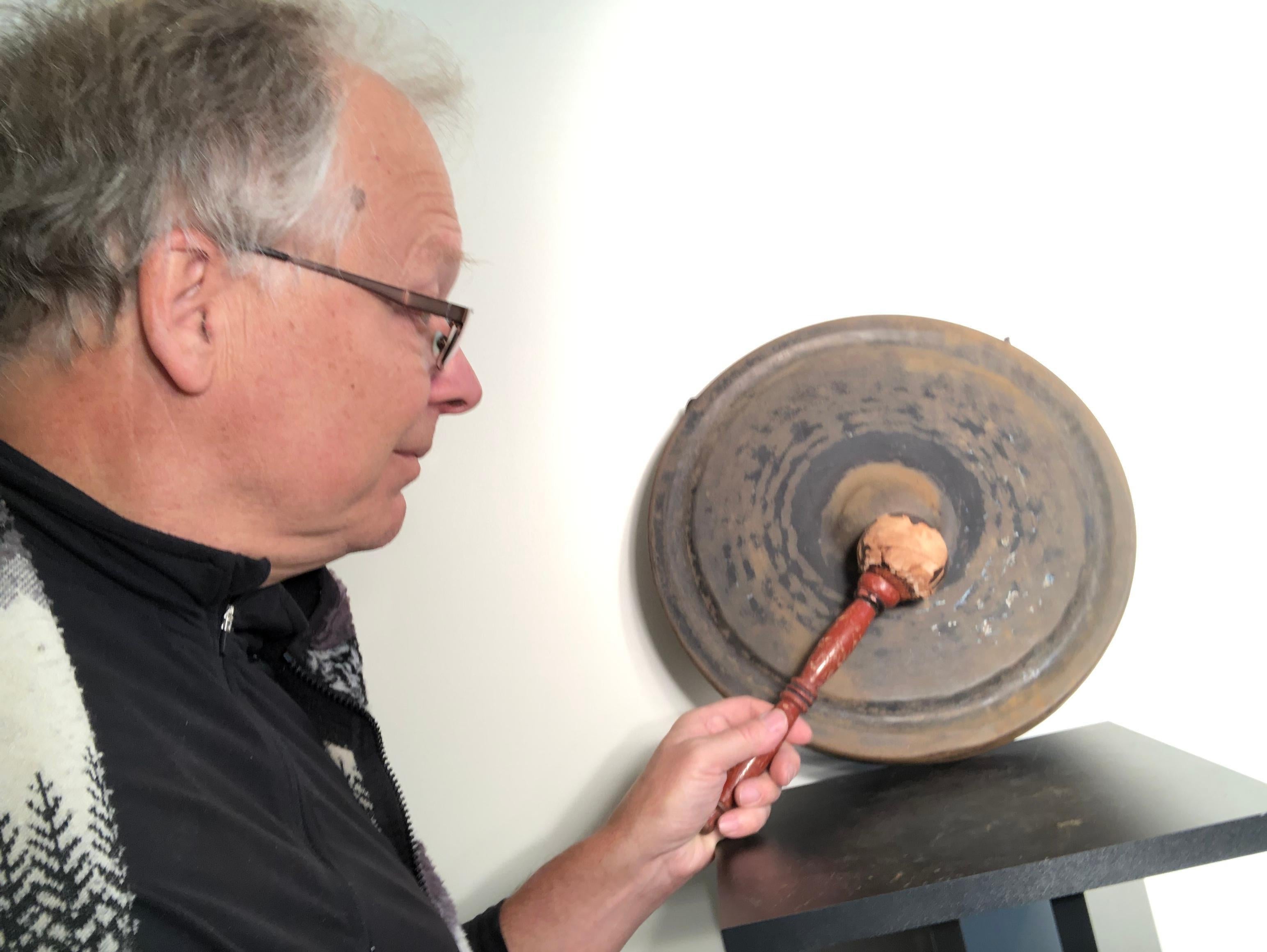 Here's a very nice large scale early 20th century bronze garden temple gong with striker which we just found in an old Kyoto collection.

Dimensions: substantial 14.5 inches diameter. Two inches thick and comes complete with an old striker. And