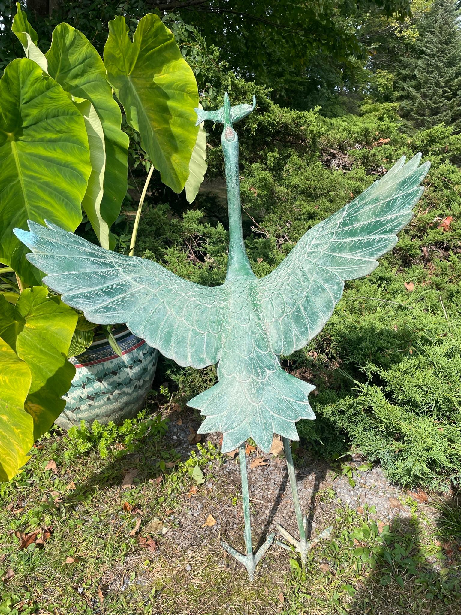 Just received from our last shipment from Japan- the first we've seen 

Japan, a fine tall large scale red crested bronze garden crane purposely crafted as a garden fountain with a water spout and serving as an attractive garden center piece.  It