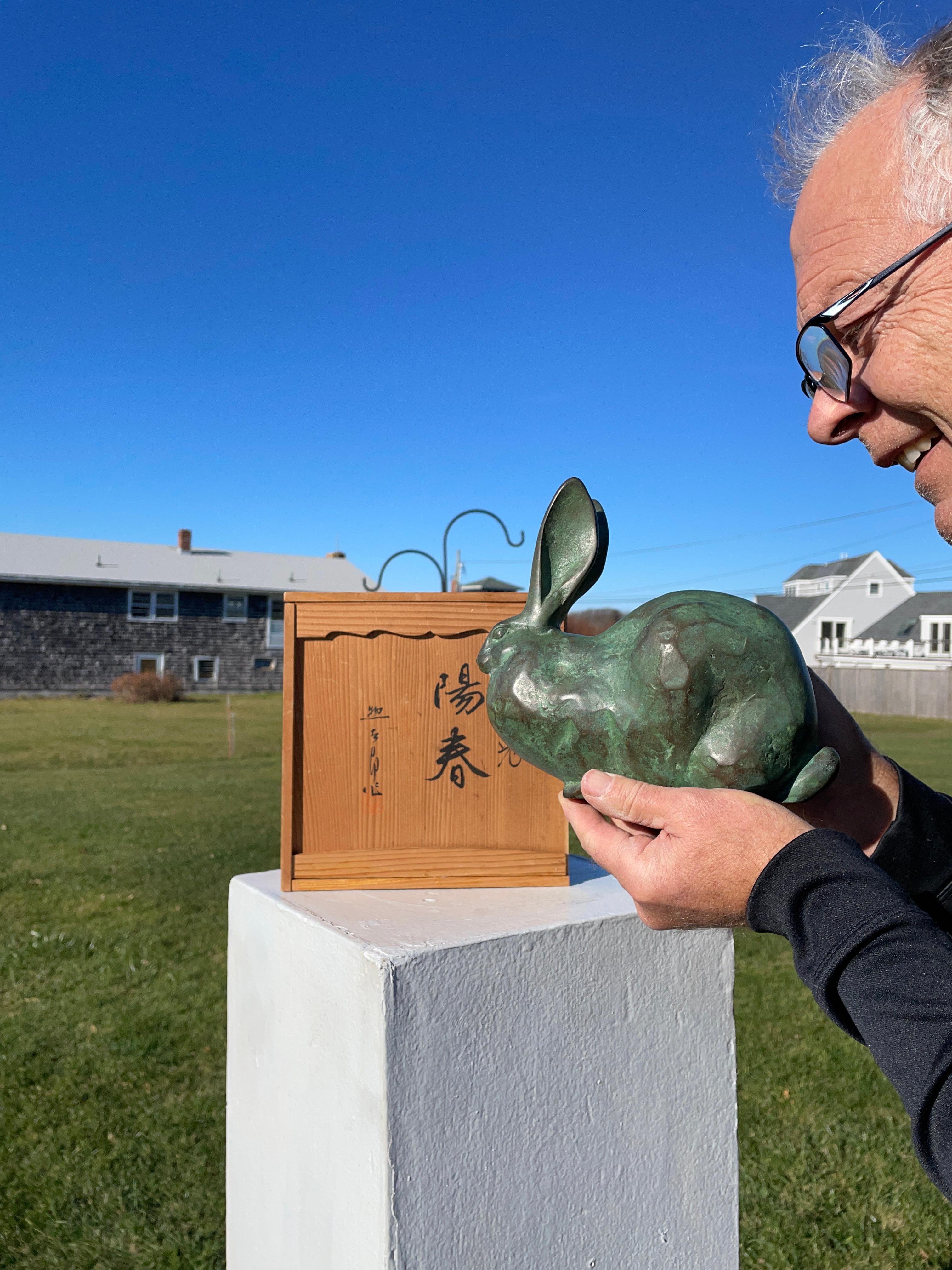 Here's a beautiful and unique way to accent your garden or indoor display space with this rare treasure from Japan.

Handsome big plump garden rabbit hand painted in an appealing green finish design, signed on bottom and accompanied by its original