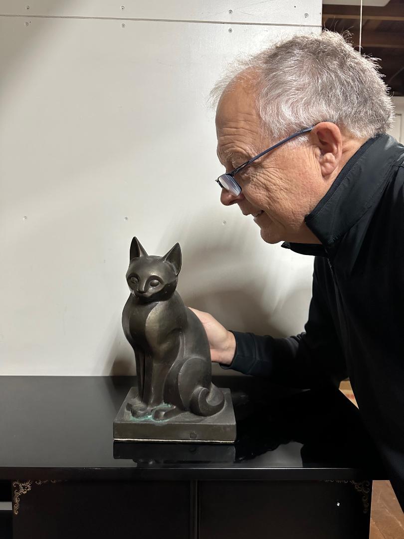 From our recent Japanese Kyoto acquisitions

A fine Japanese tall cast bronze sensuous cat beautifully handcrafted in an attractive Art Deco style. Superb and heavy casting. Sublime motion.

Signed S. Kitanha

In Japan, there are also cats described