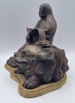 Japanese Bizen Ware Figure of Kannon Seated on a Zishi, Edo Period, ca. 1750