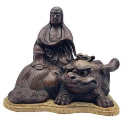 Japanese Bizen Ware Figure of Kannon Seated on a Zishi, Edo Period, ca. 1750