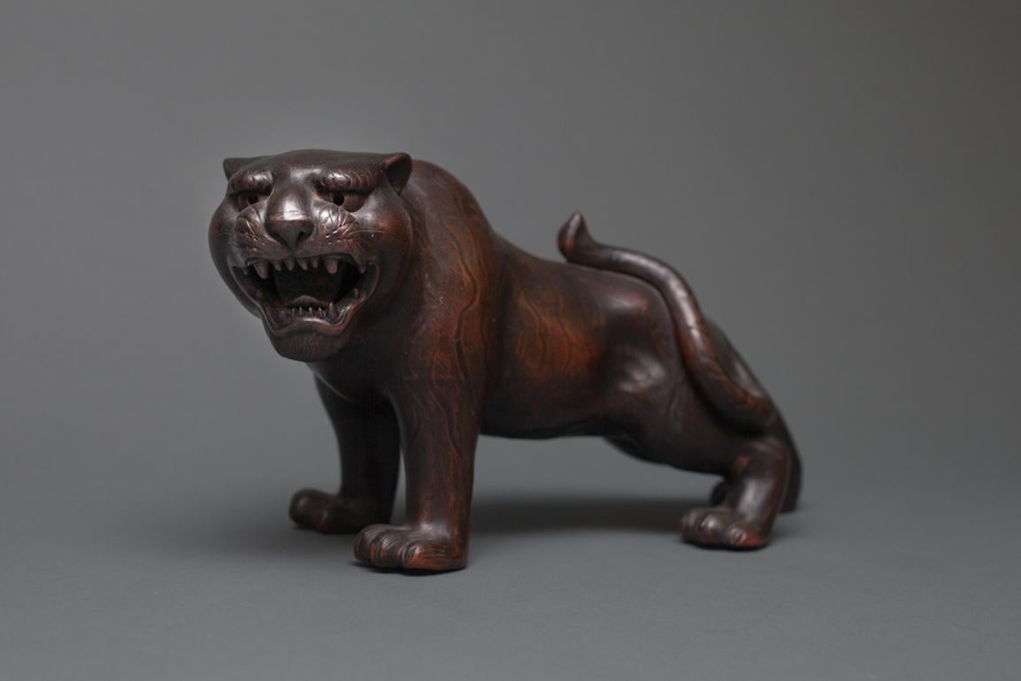 Japanese, Meiji period (circa 1900), Bizen ware sculpture of a tiger. Bizen is located in Okayama prefecture. The area produces a very unique, dark clay and has a history of producing ceramics for more than 1,000 years. Bizen is one of the six