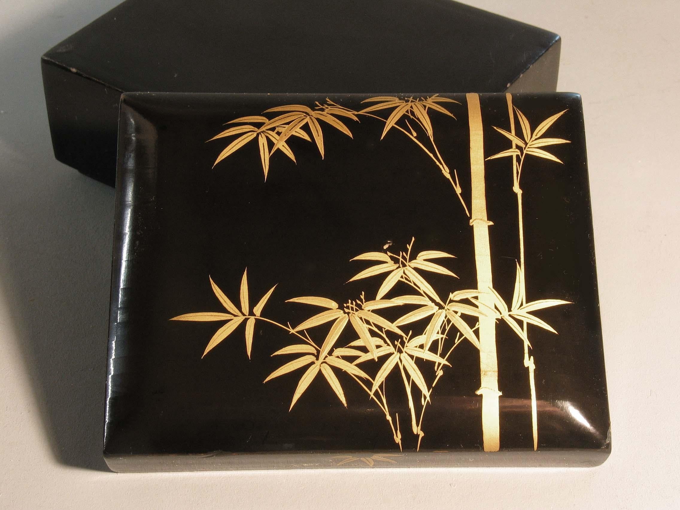 20th Century Japanese Black Lacquer Box Together with a Blue and White Arita Plate For Sale