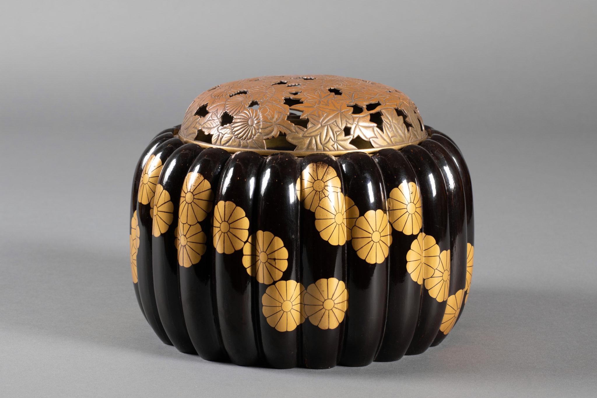 With chrysanthemum motif and a gilded bronze lid. Includes unsigned collector's box. Interior measurements: 7 1/2