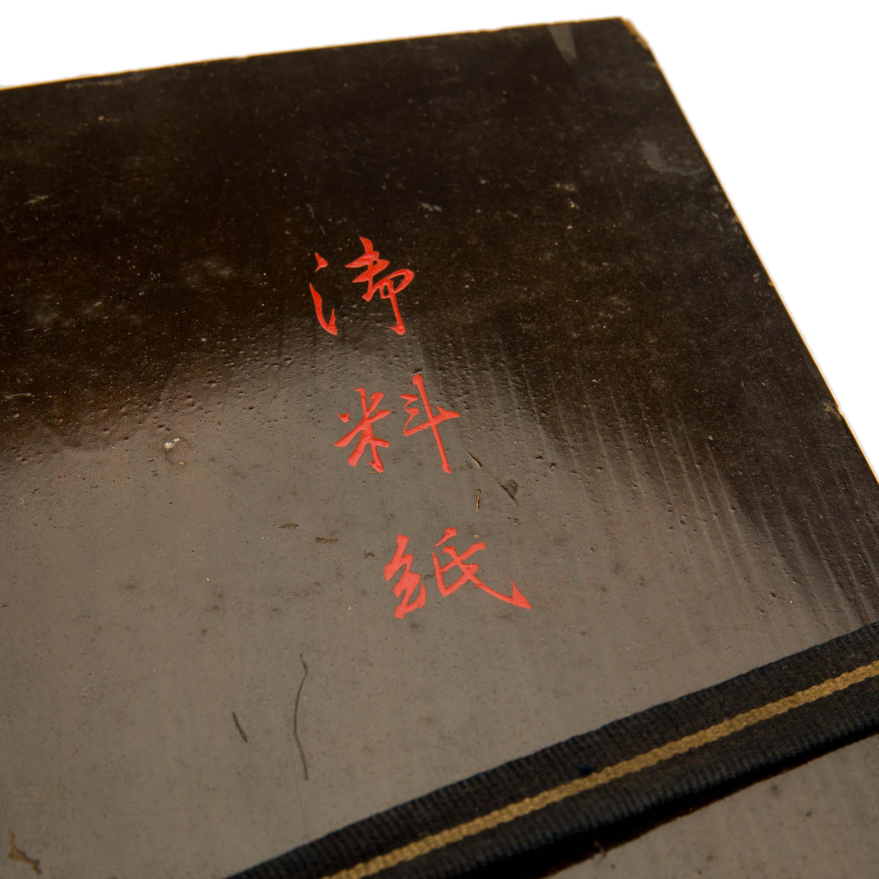 A high quality, antique, Japanese black lacquer document box. It has an external design of gold maki e plum blossoms. In Japanese culture plum blossom symbolises the beginning of Spring, having its own festival, the Ume Matsuri, alongside the more