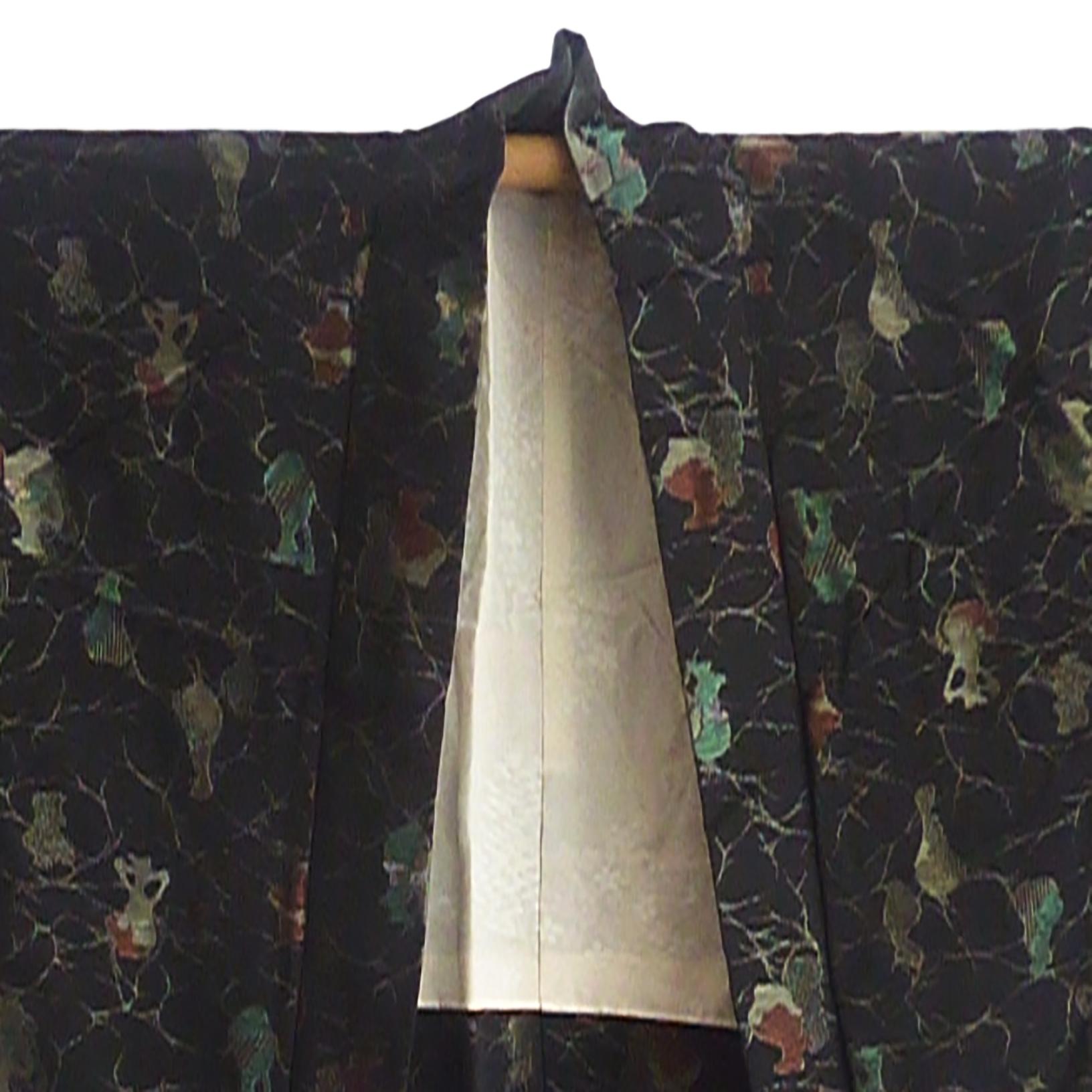 Unisex Haori kimono jacket with subtly dramatic deep sleeve drops.
Fabric: Silk brocade.
Ecru sakura cherry blossom tree silk jacquard lining.
Circa: Meiji
Place of Origin: Japan
Material: Silk
Condition: Very good
Total length 36